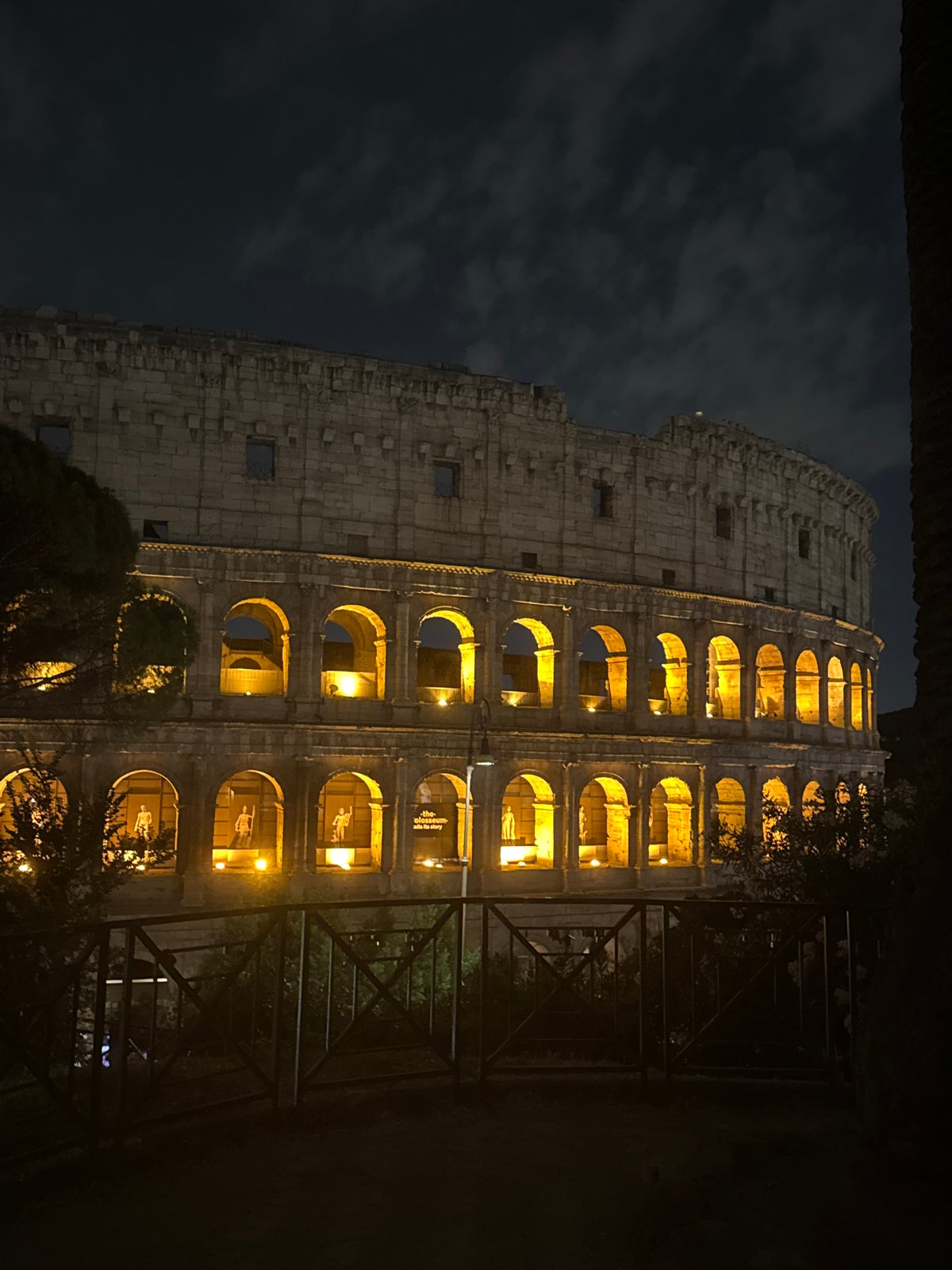 Evening photography session captures illuminated Colosseum in Rome