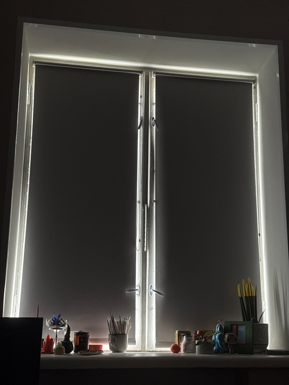 LED-lit window with dark shades observed in Moscow