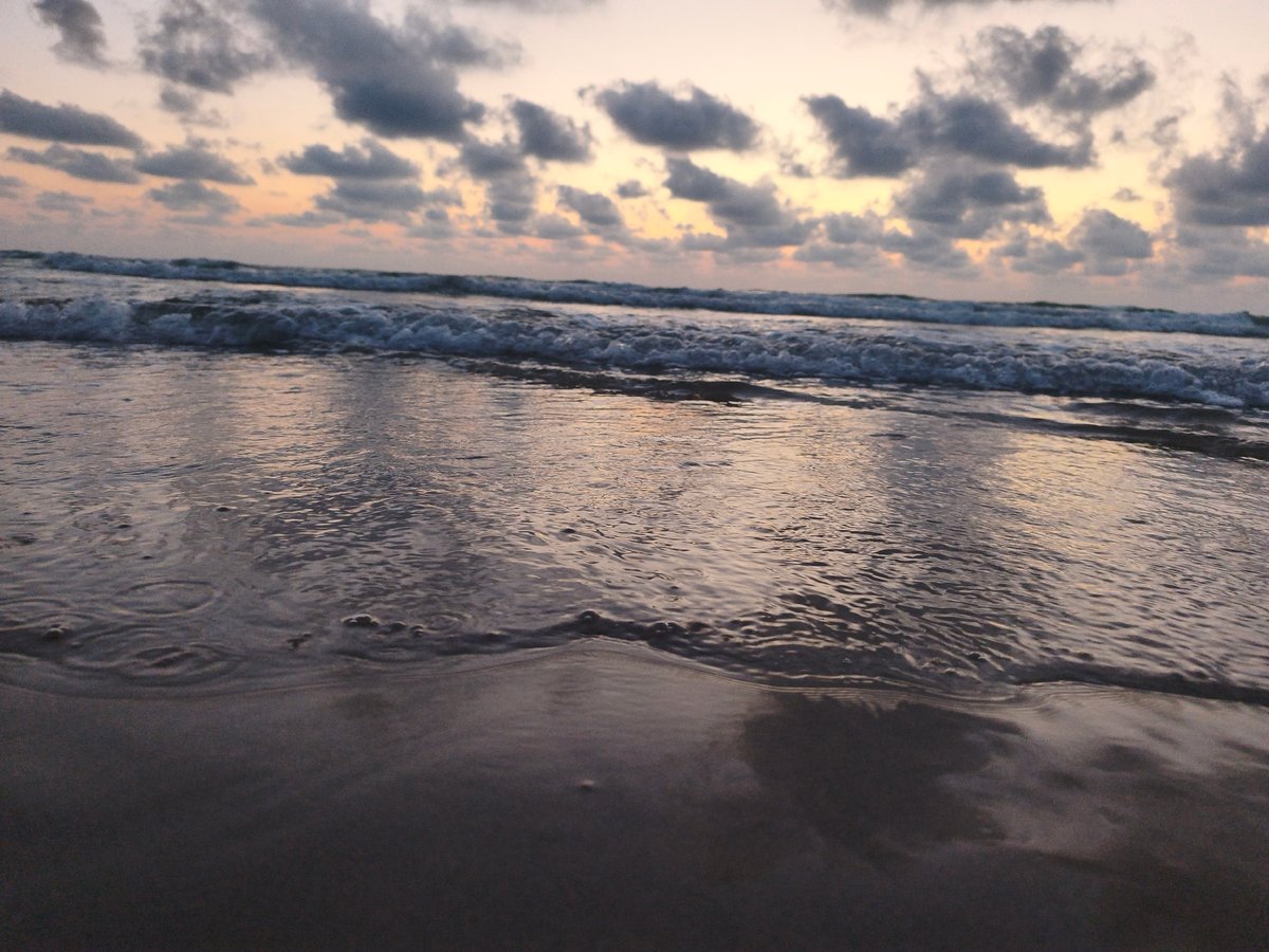 Sunset waves on the Mediterranean shore in Hadera