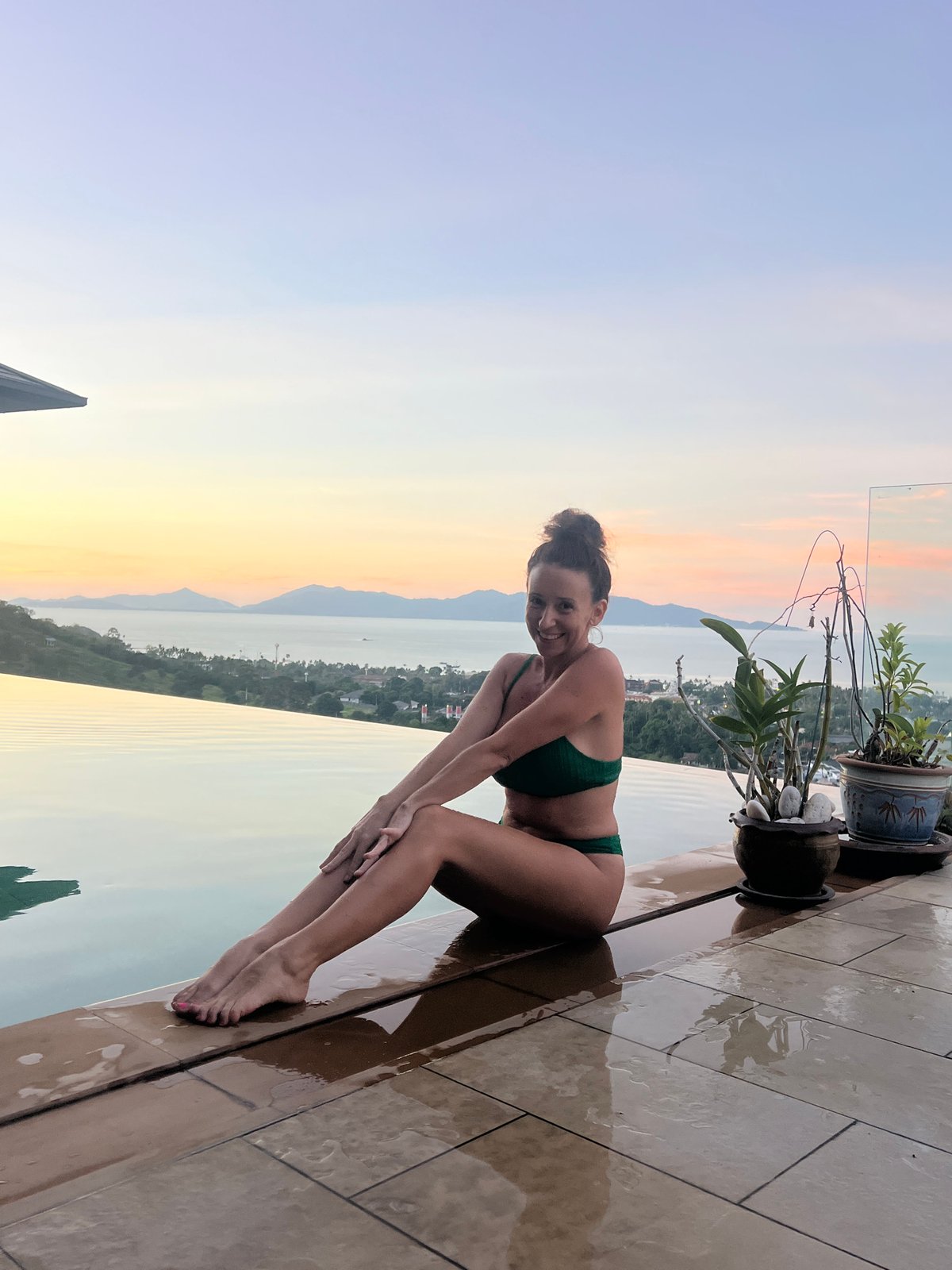 Tourists enjoy infinity pools at Thai resort destinations