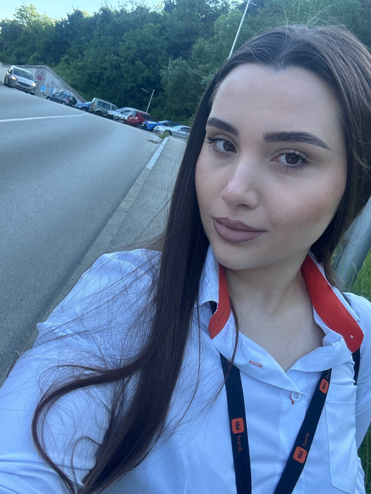 Bank employee takes selfies in Gabrovo, Bulgaria