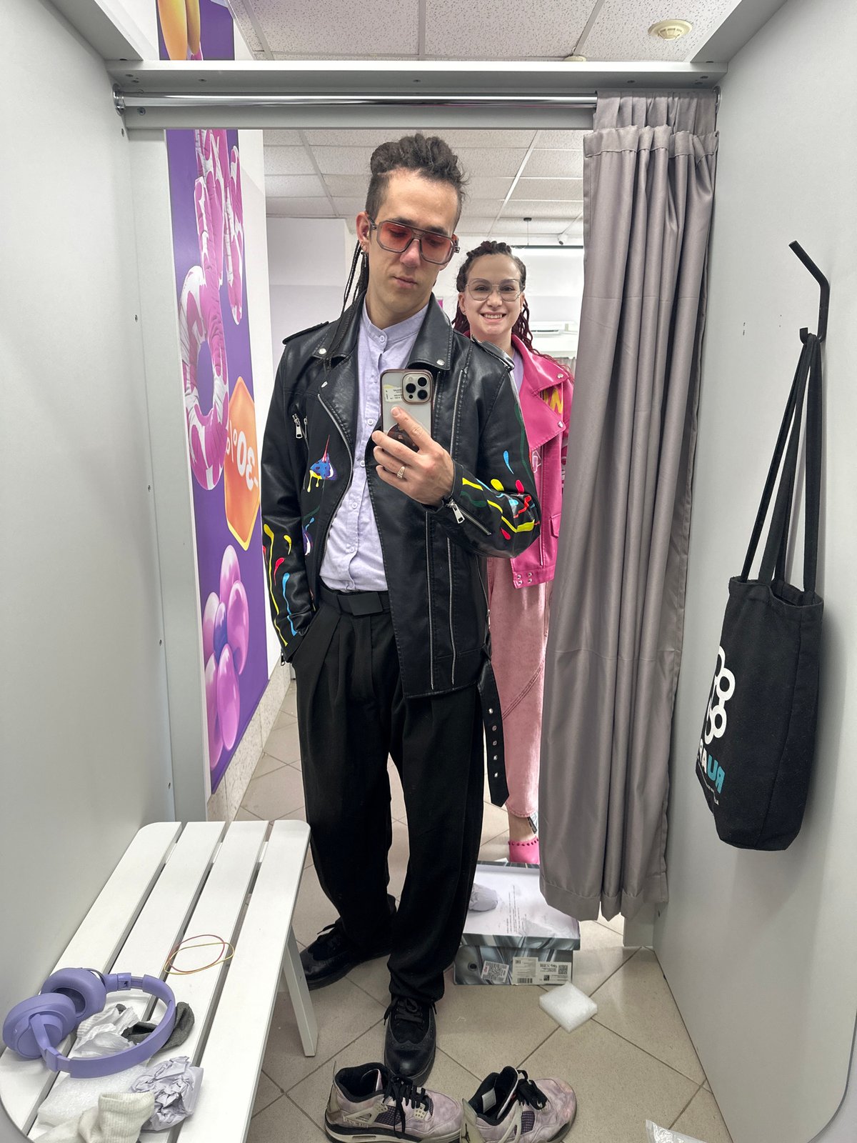 Shoppers try on clothes in Saratov fitting room