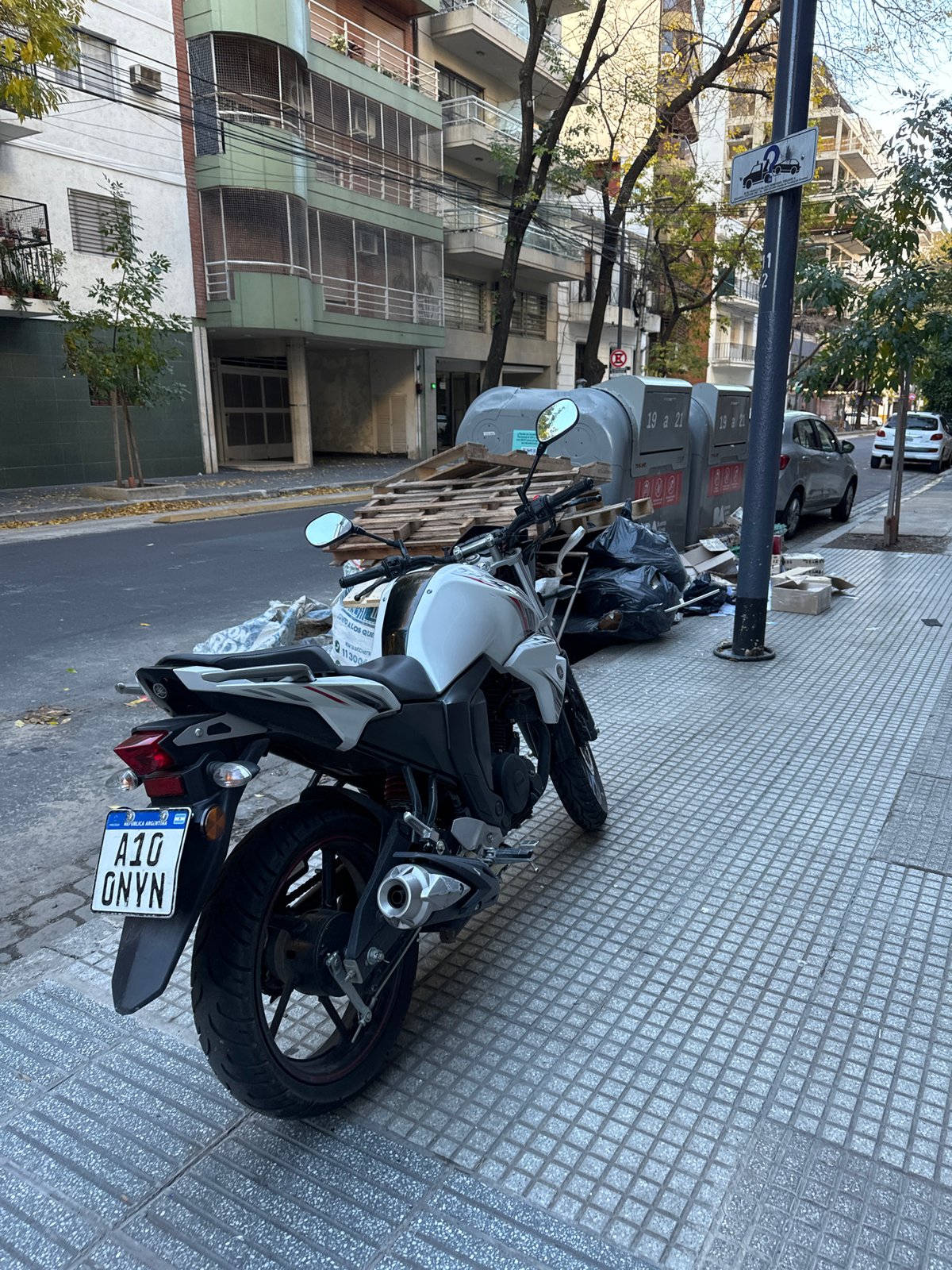Buenos Aires resident documents street life, personal belongings during evening