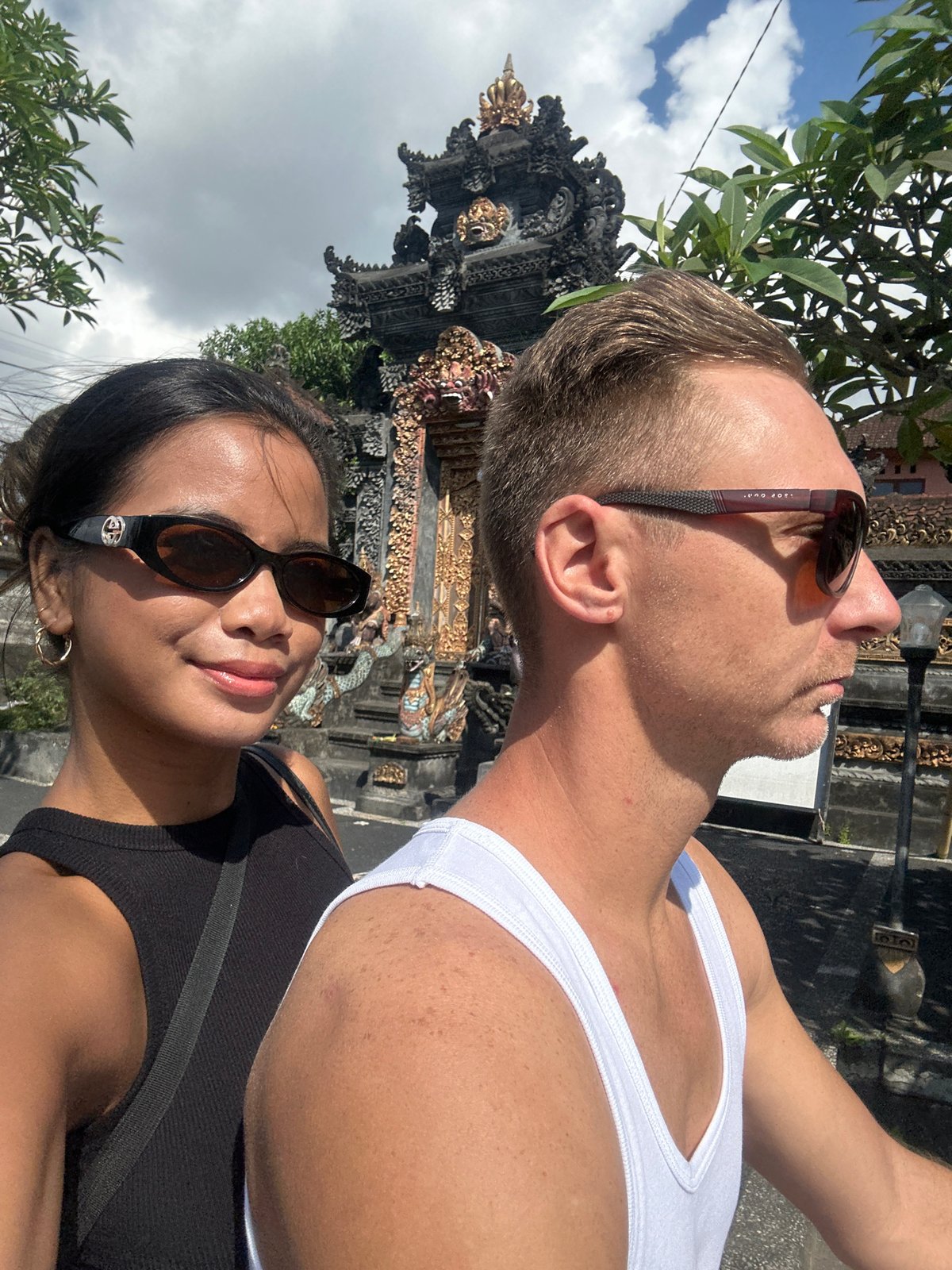 Selfies and portraits near Balinese temple gate in Sukawati