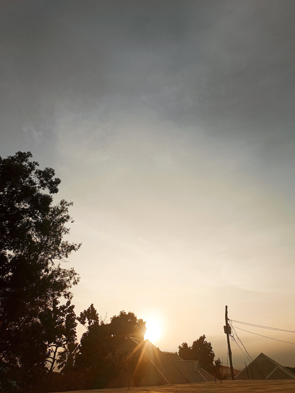 Daily life documented in Bukuru, Nigeria during sunset hours