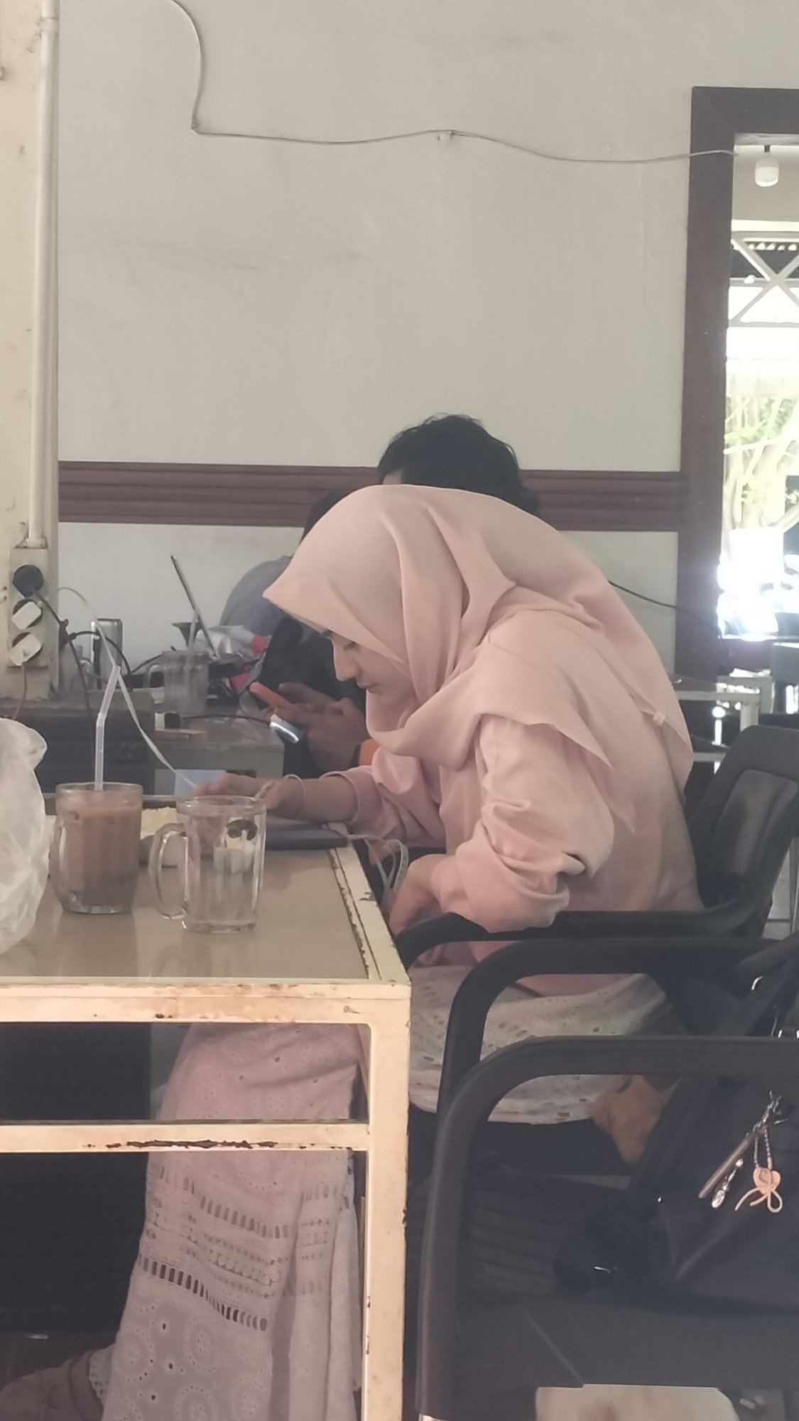 Casual cafe hangout in Lhokseumawe, drinks and downtime