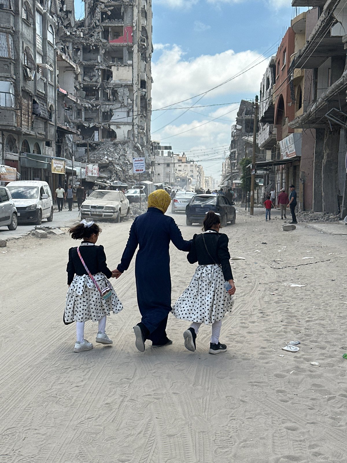 Gaza residents navigate daily life among damaged buildings