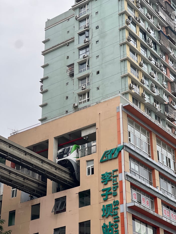 Early morning activity captured at Chongqing's building-integrated train station