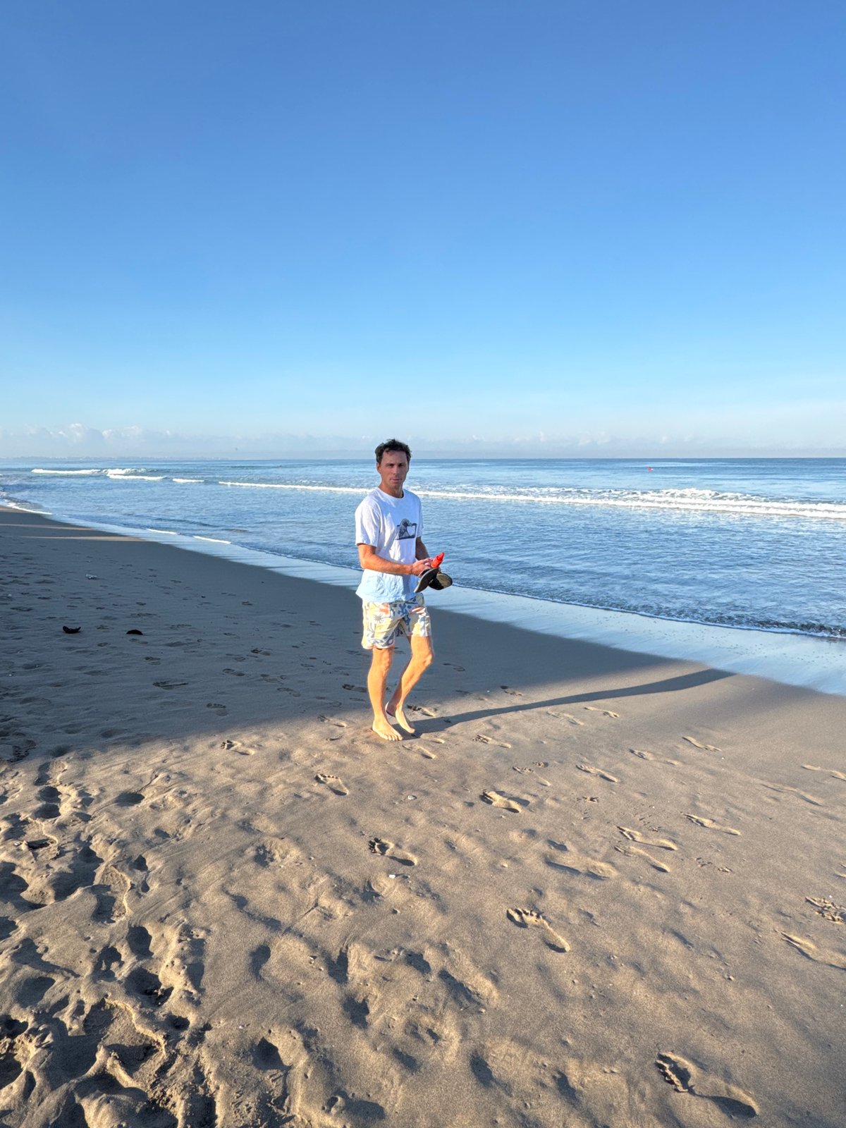 Evening beach life captured at Kuta Beach, Bali