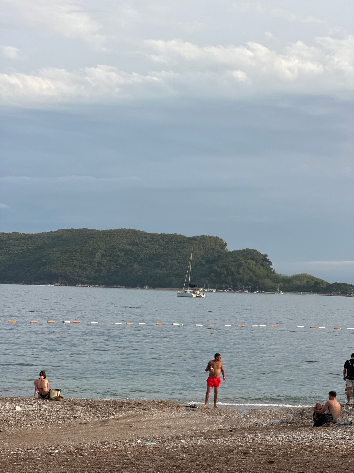A lazy afternoon along Budva's pebble beach and streets