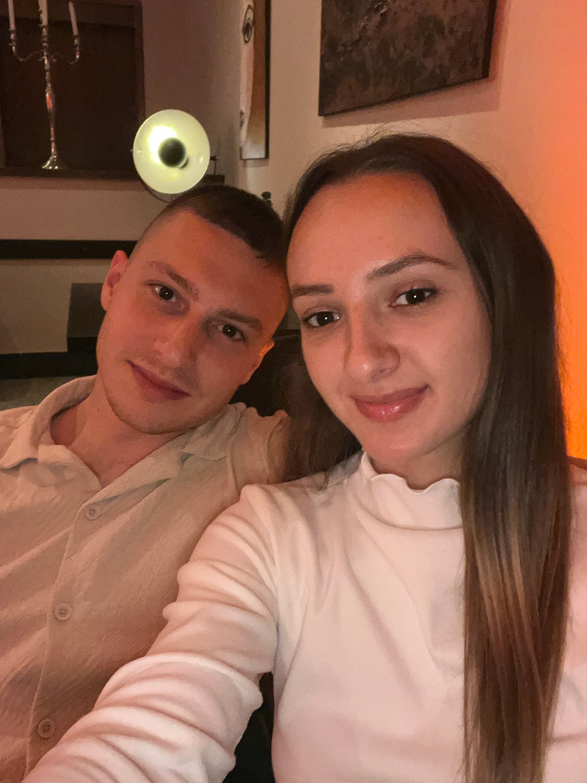 Couple enjoys evening cocktails at atmospheric Saarbrücken restaurant