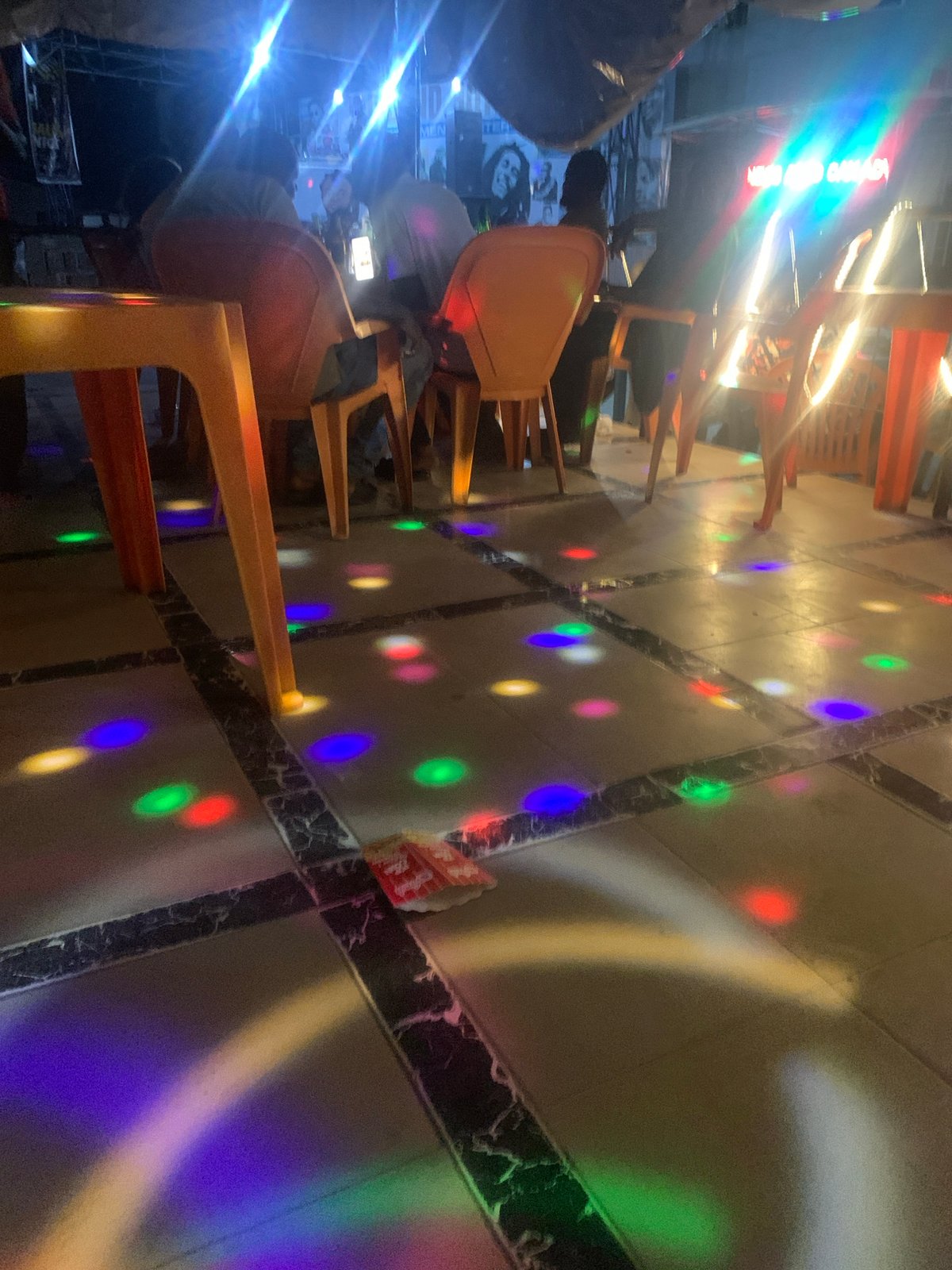 Restaurant in Ado, Nigeria observed during evening hours