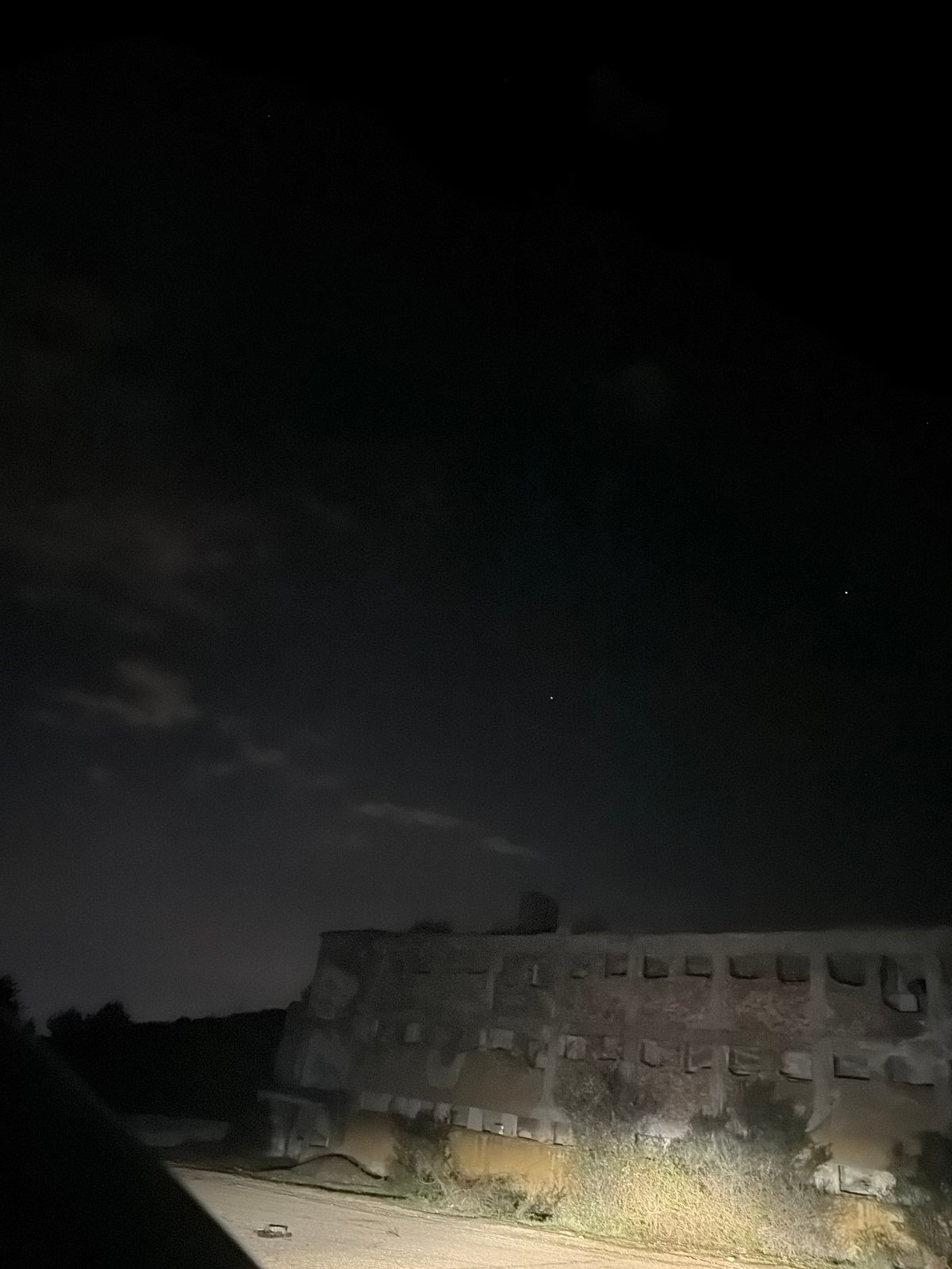 Nighttime drive through Sofia captures urban structures and roads