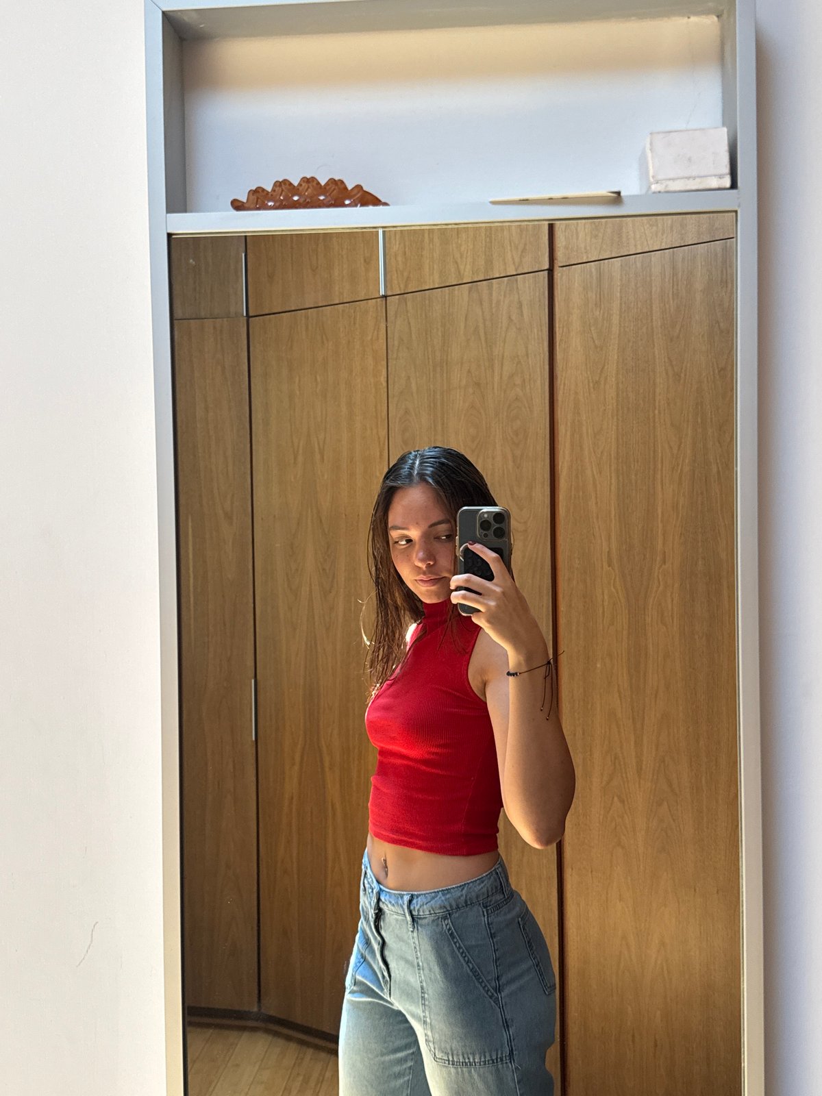 Woman takes mirror selfies in San Bernardino Tlaxcalancingo