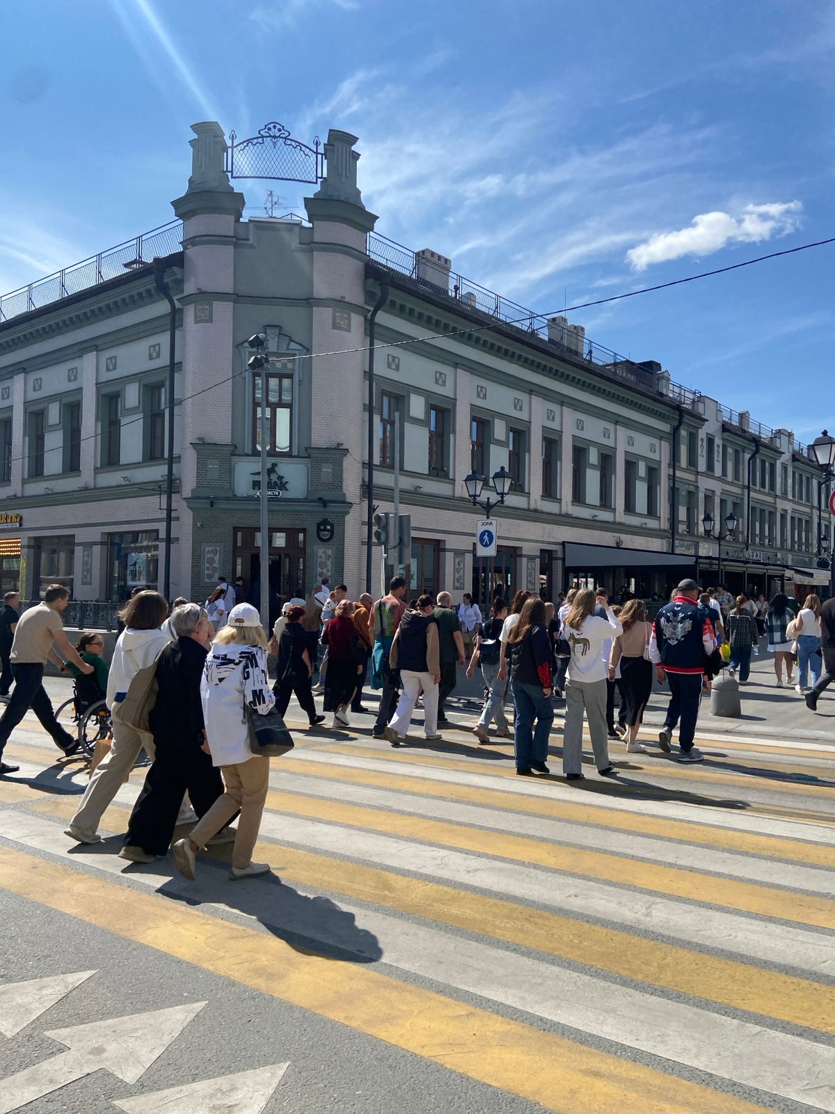 Sunny Saturday morning street life documented across central Kazan