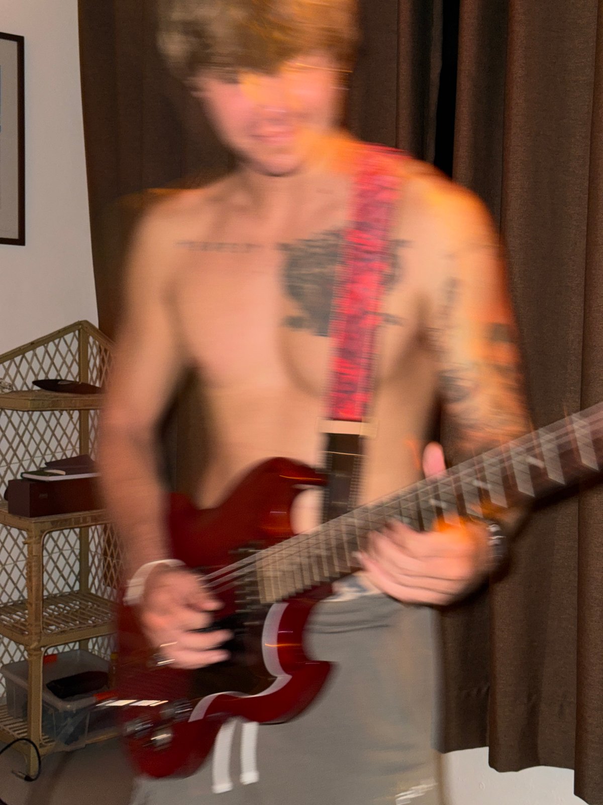 Late-night guitar session in a coastal Sri Lanka room