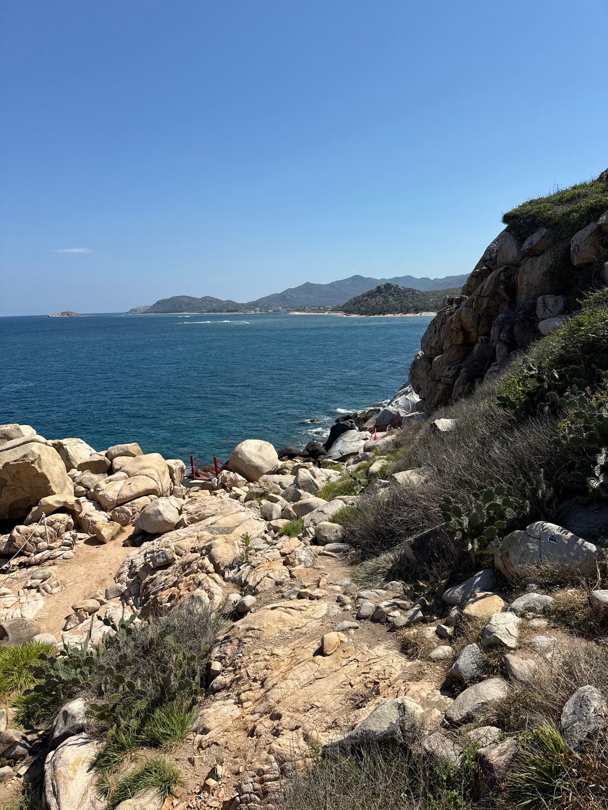 Tourist enjoys scenic morning at Vinh Hai coastal cliffs