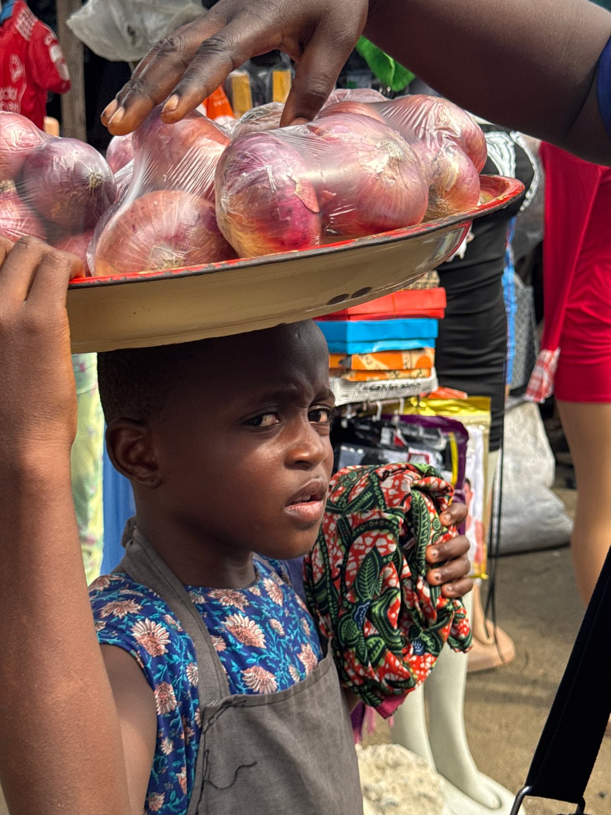 Daily life documented across Nigerian street markets and urban areas