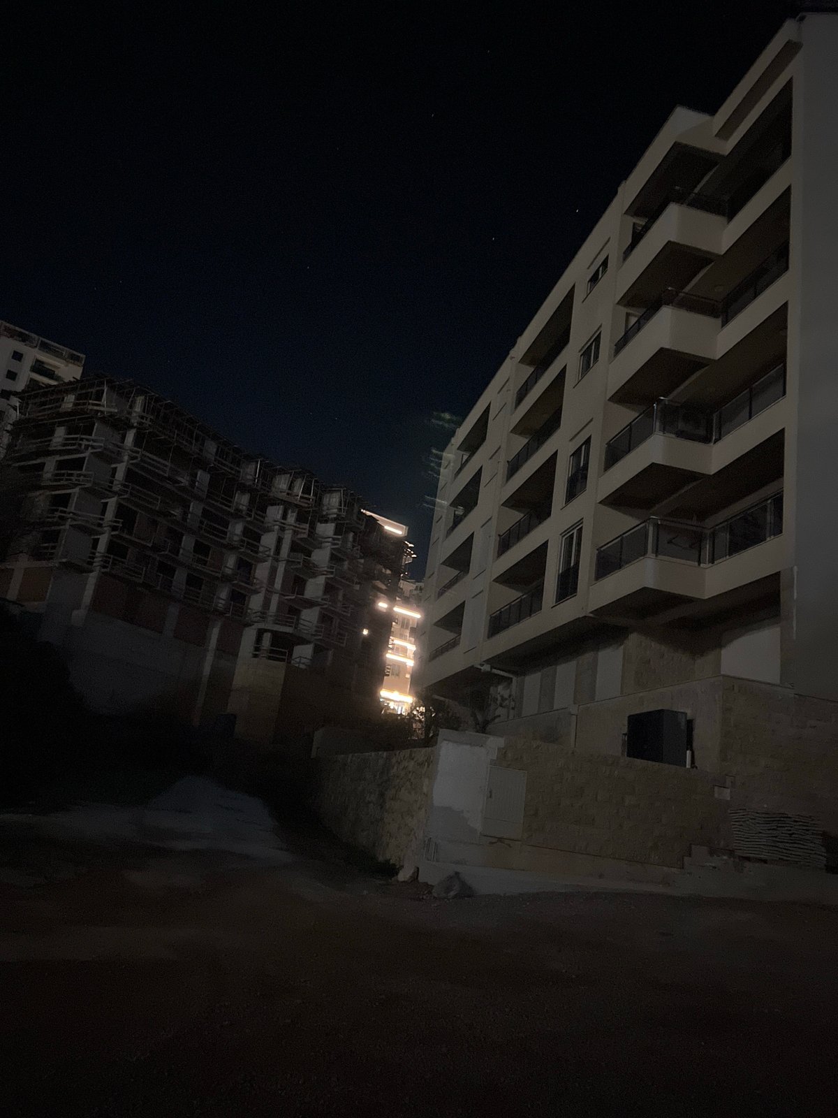 Night view of residential buildings in Boreti, Montenegro