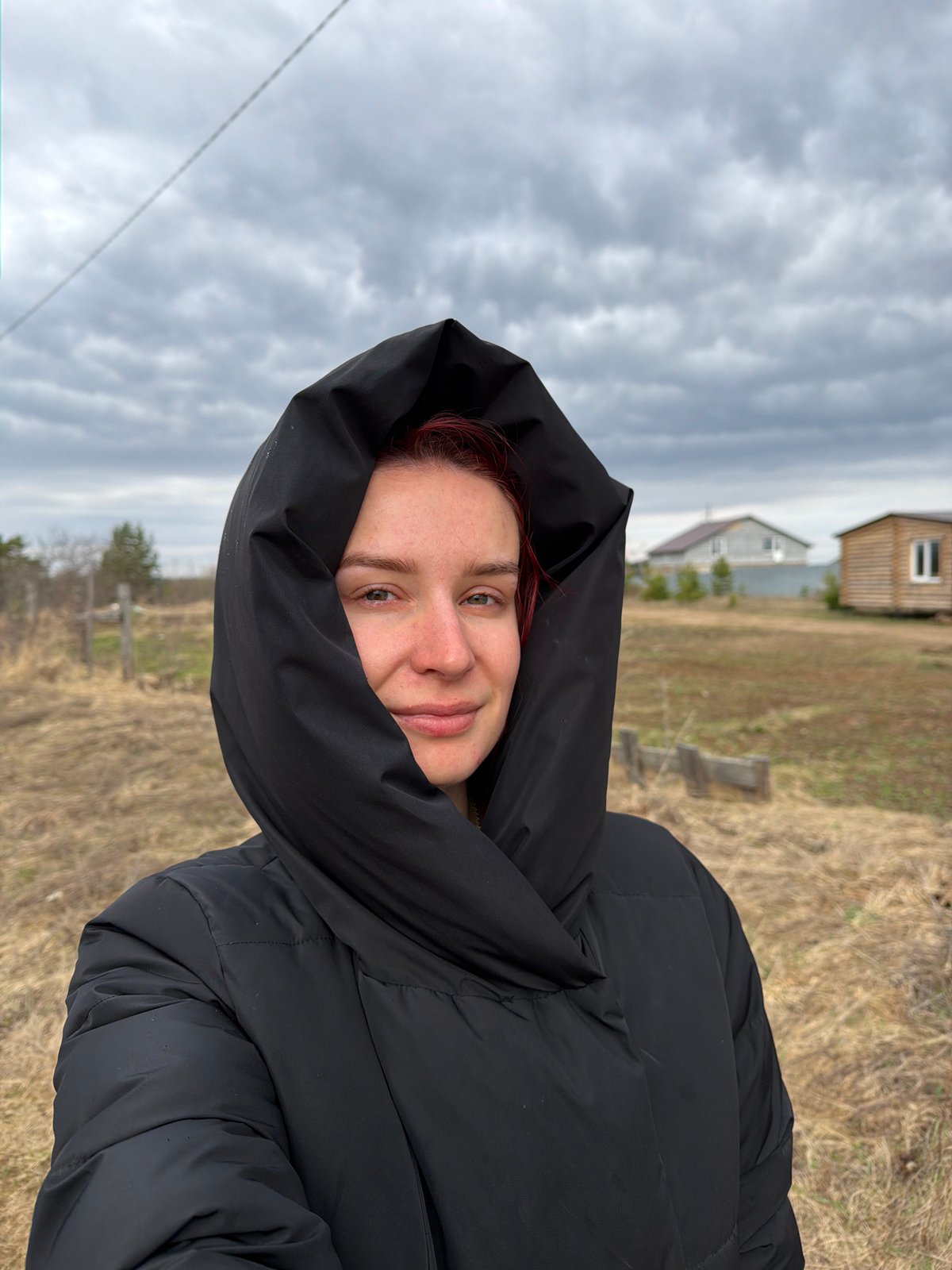 Woman photographed smiling outdoors in Chaikovsky, Russia