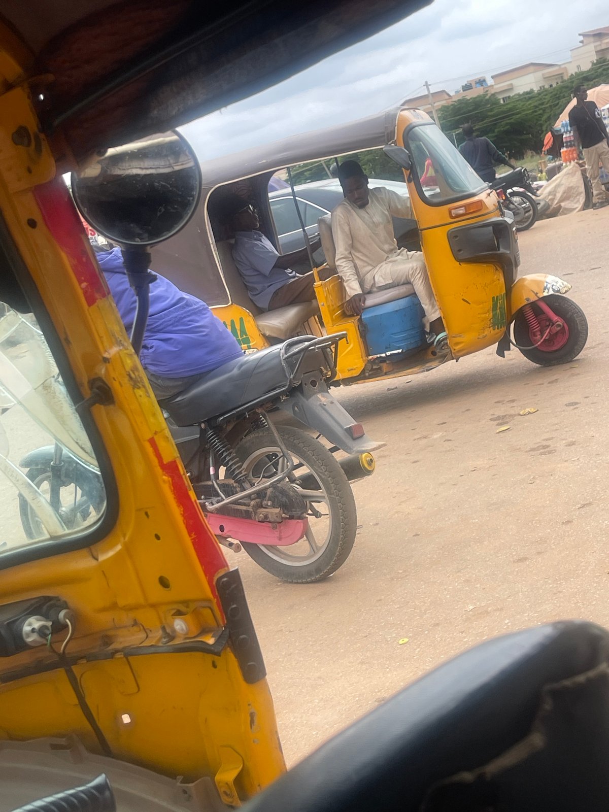 Keke Napeps and street life in Galadimawa Village, Abuja