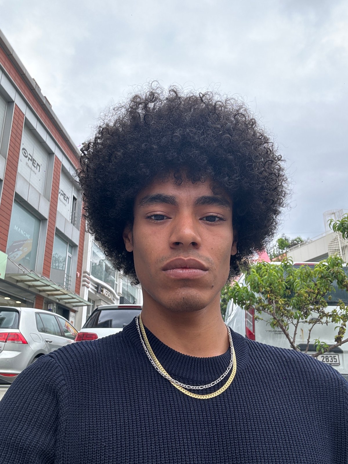 Man takes selfies on street in Güngören, Turkey