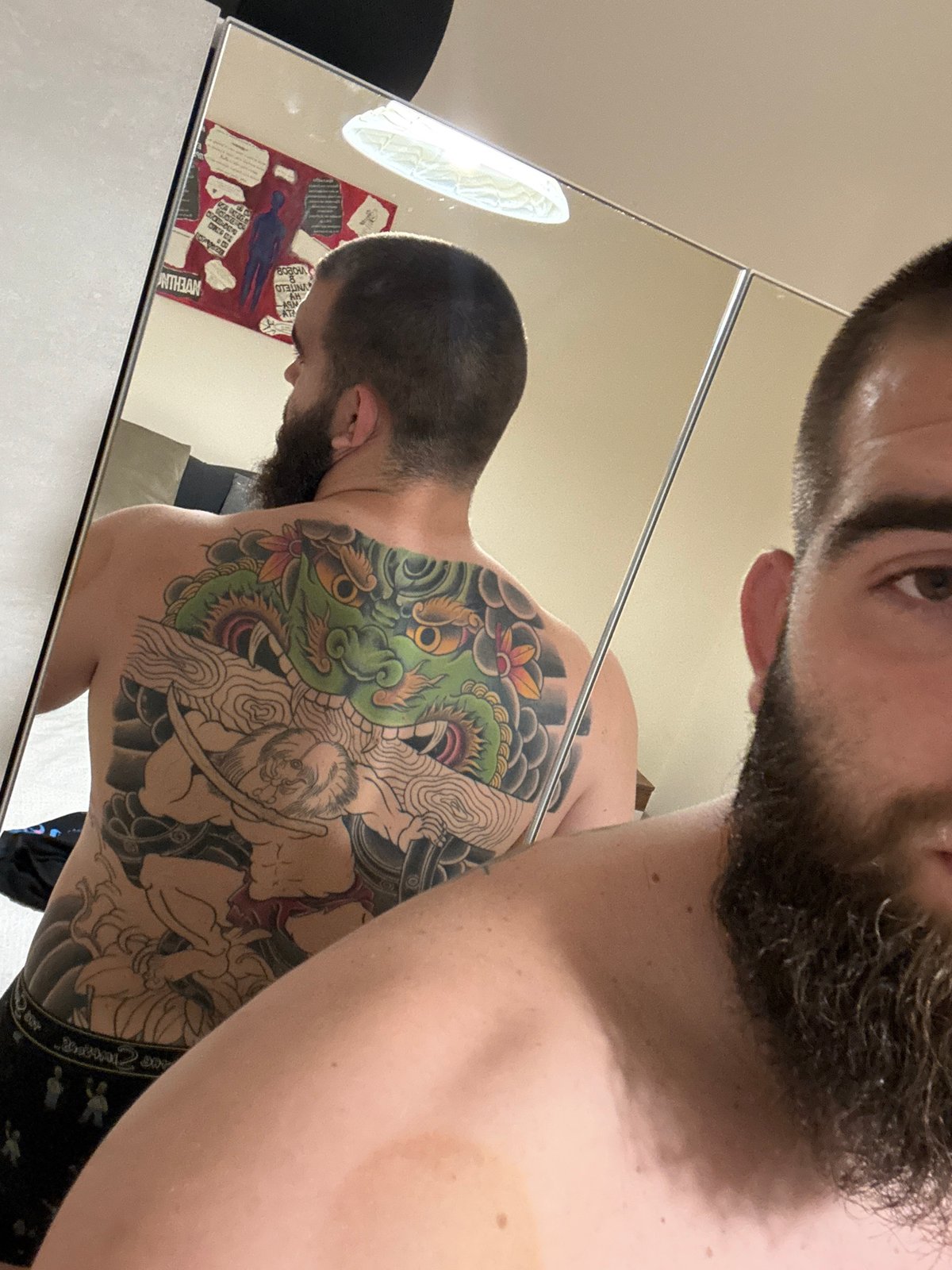 Man takes mirror selfie revealing colorful tattoo in Bulgaria