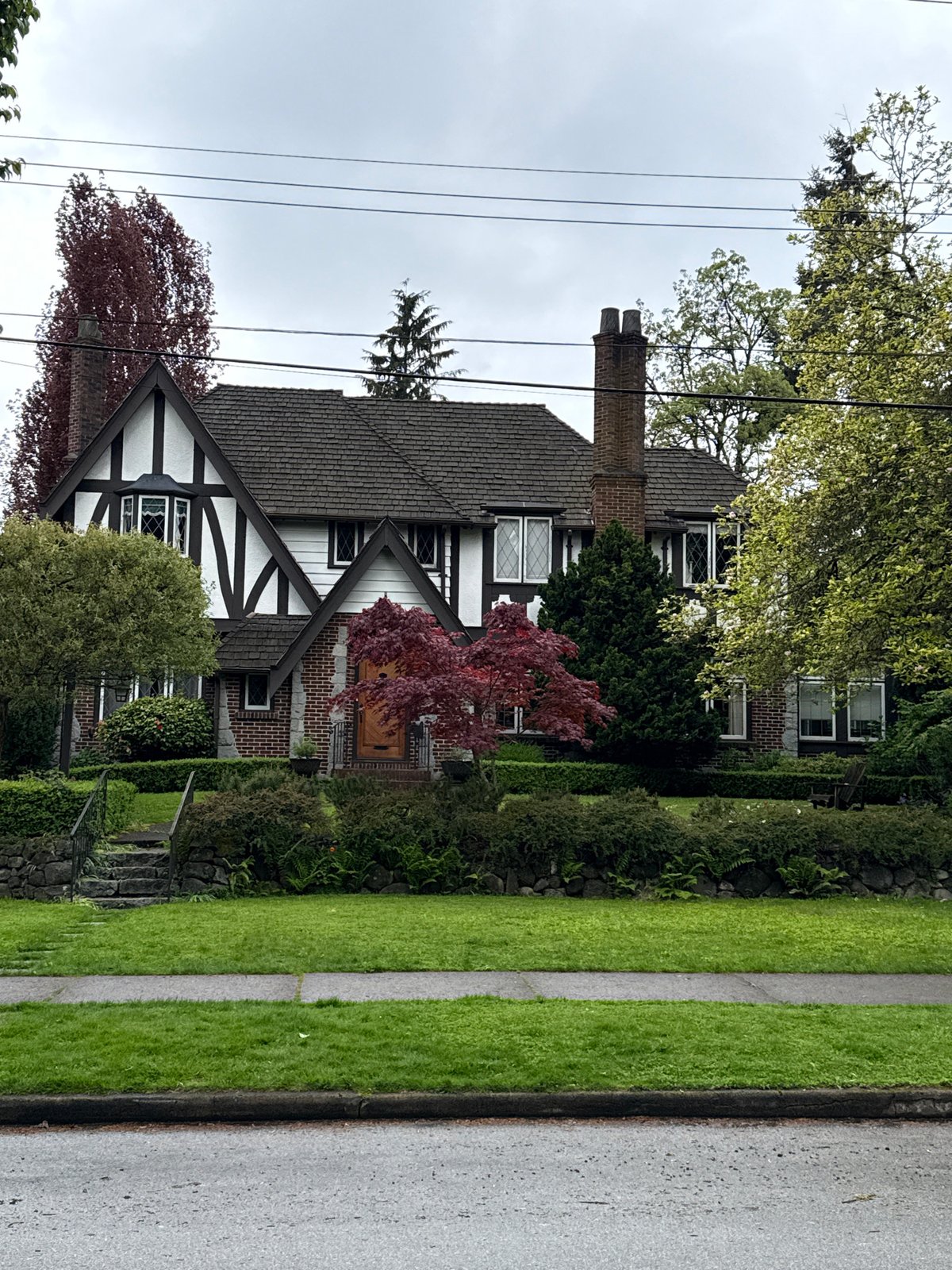 Tudor Revival house documented in New Westminster residential area