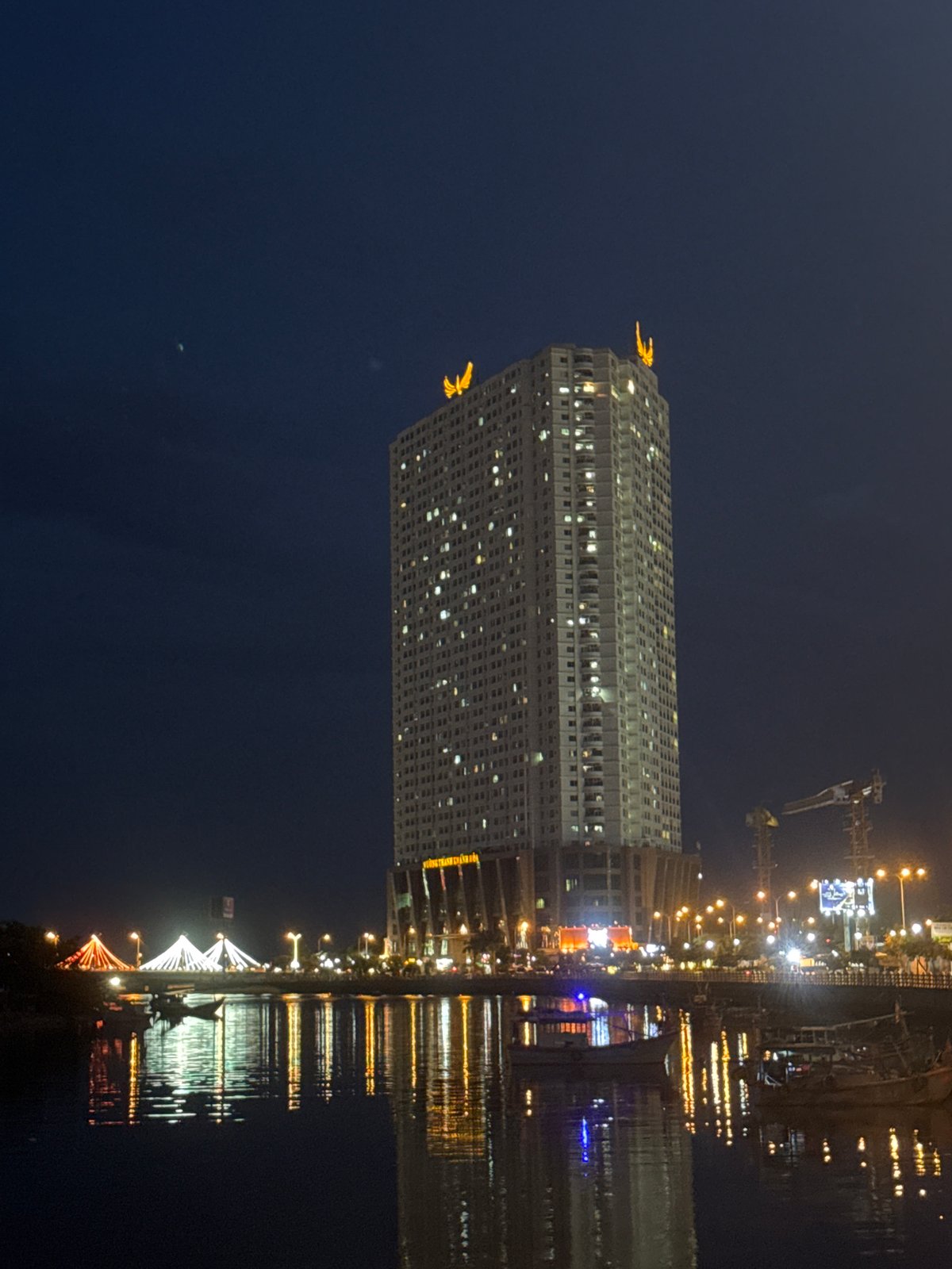 Nha Trang nights: stormy coastline, standout skyscraper, snack break