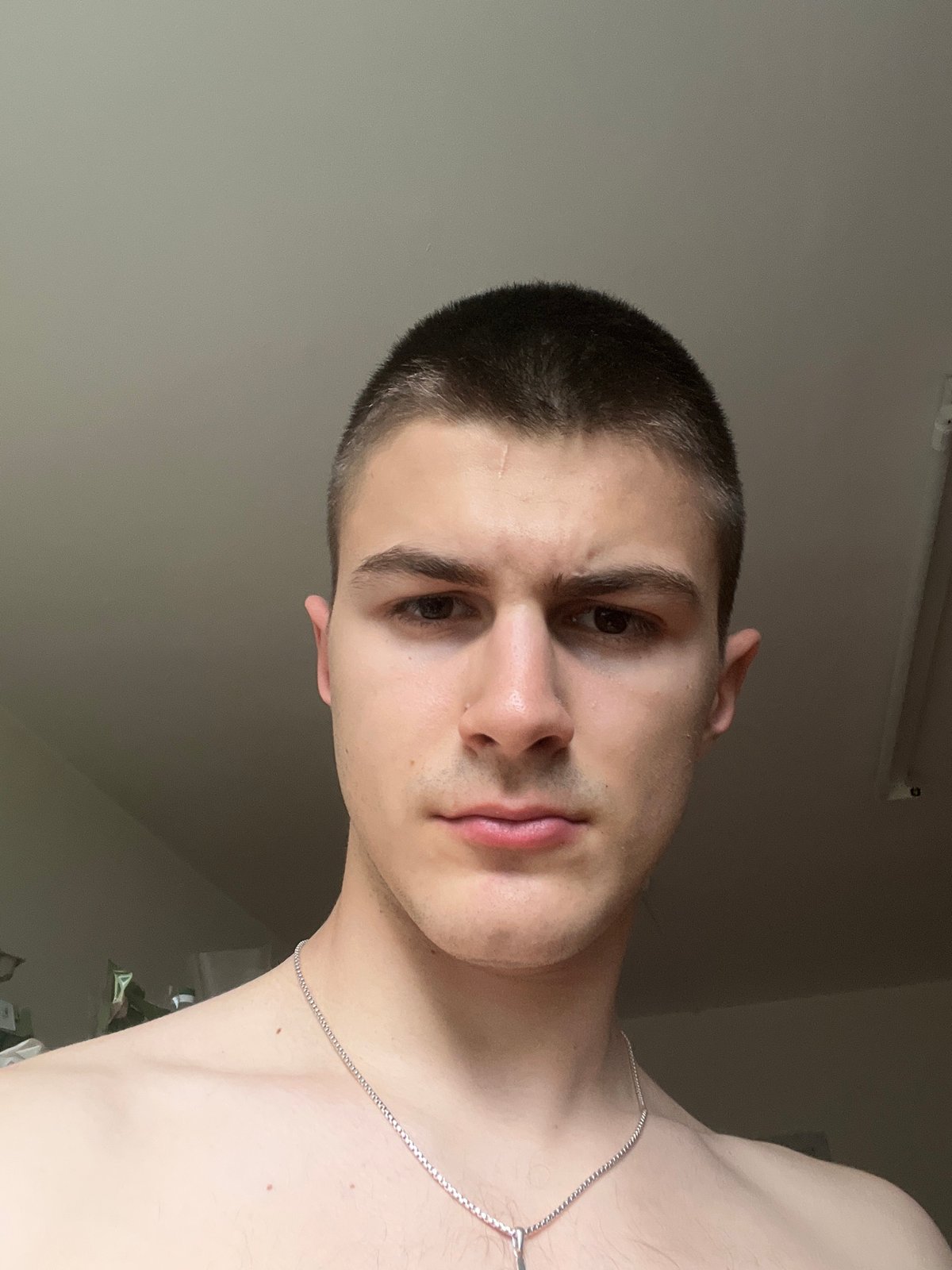 Young man photographed in multiple mirror selfie angles
