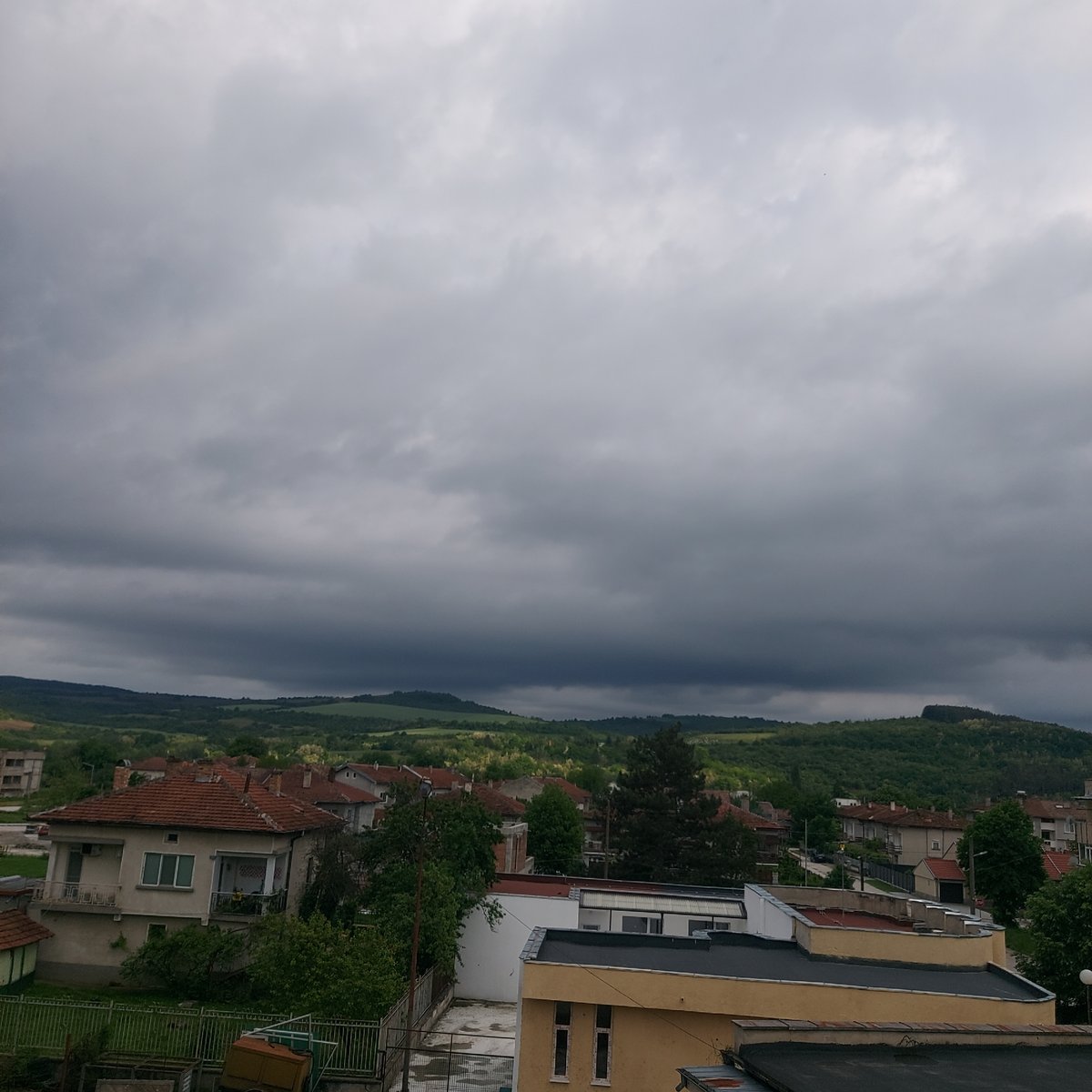 Storm clouds gather over Strazhitsa, Bulgaria countryside