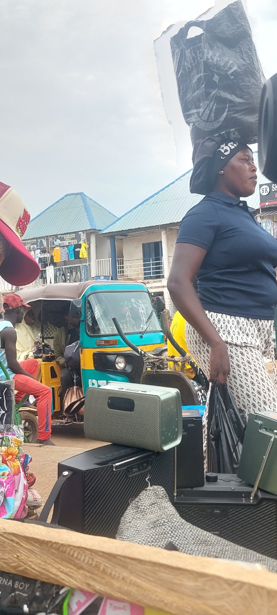 Street market bustling with vendors and commerce activity