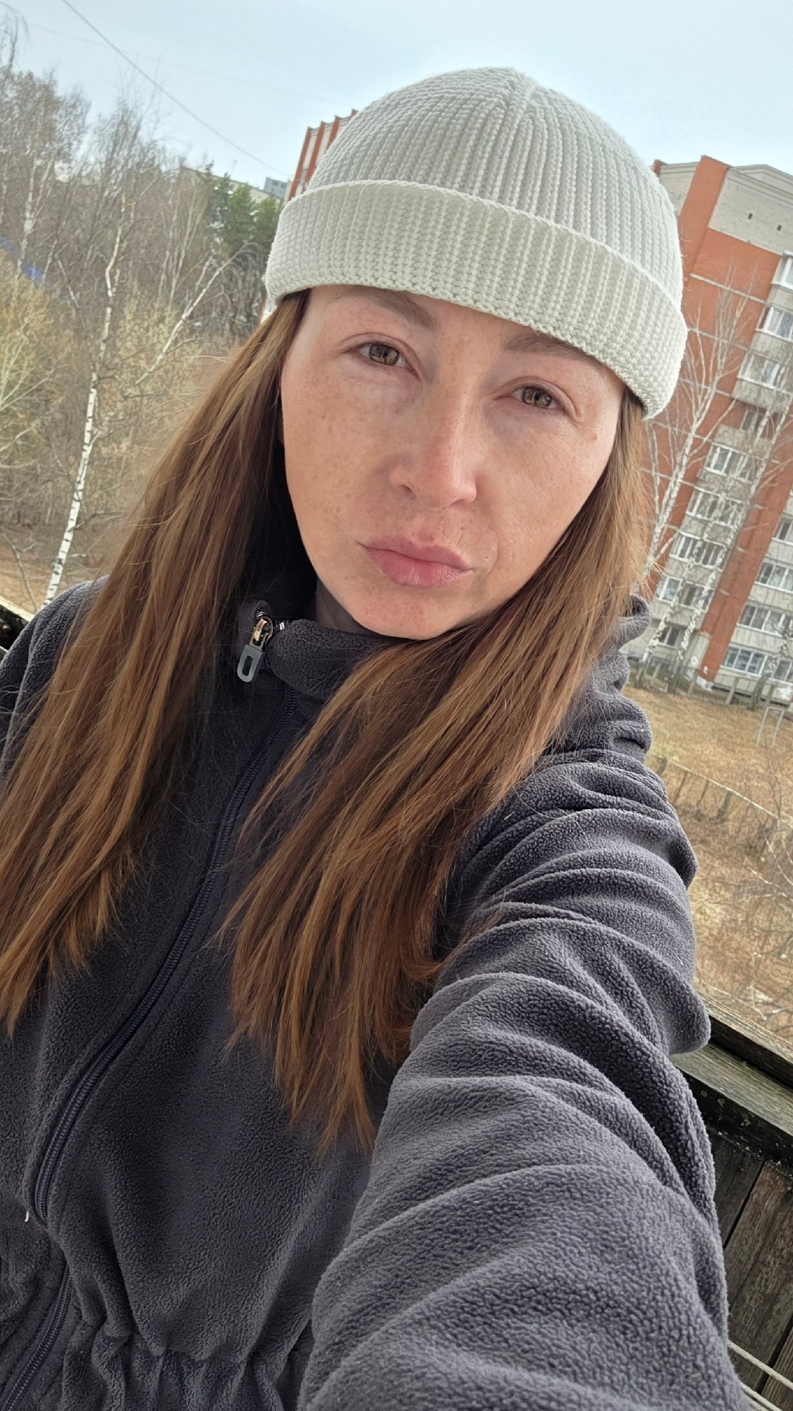 Person in beanie photographed outdoors early morning April 19