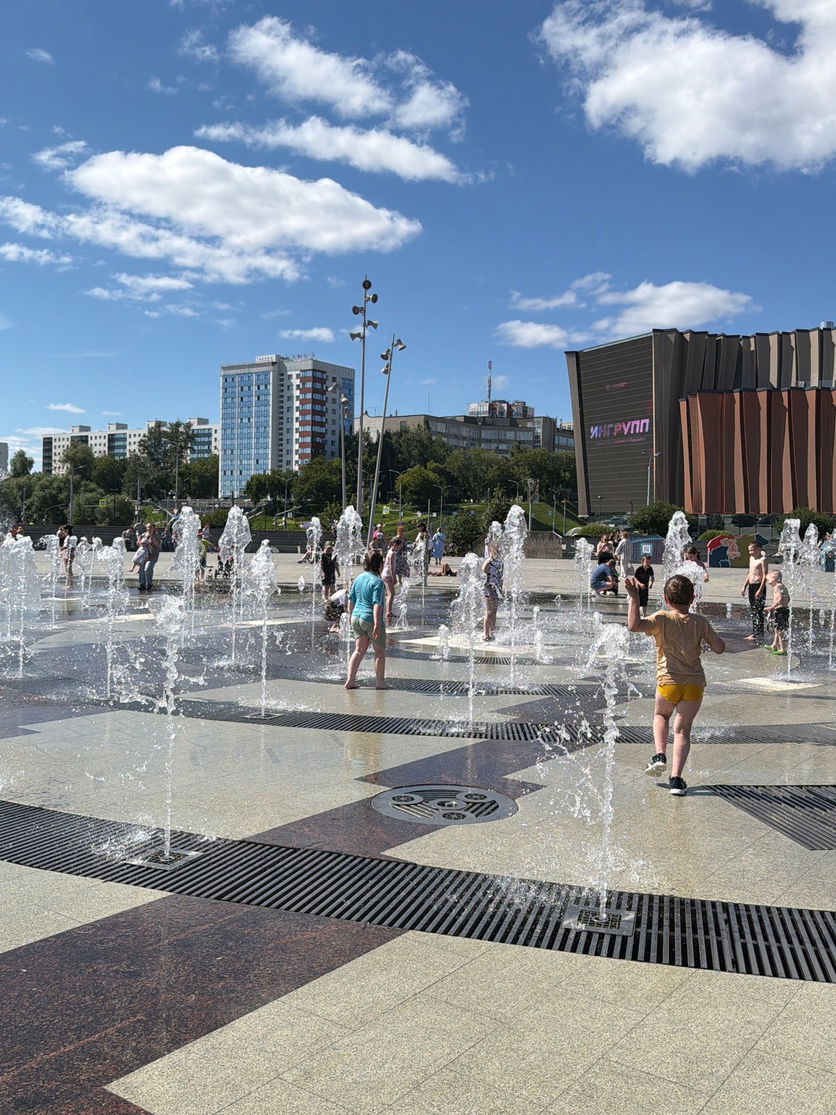 Summer morning around central Perm: streets, fountains, and city life