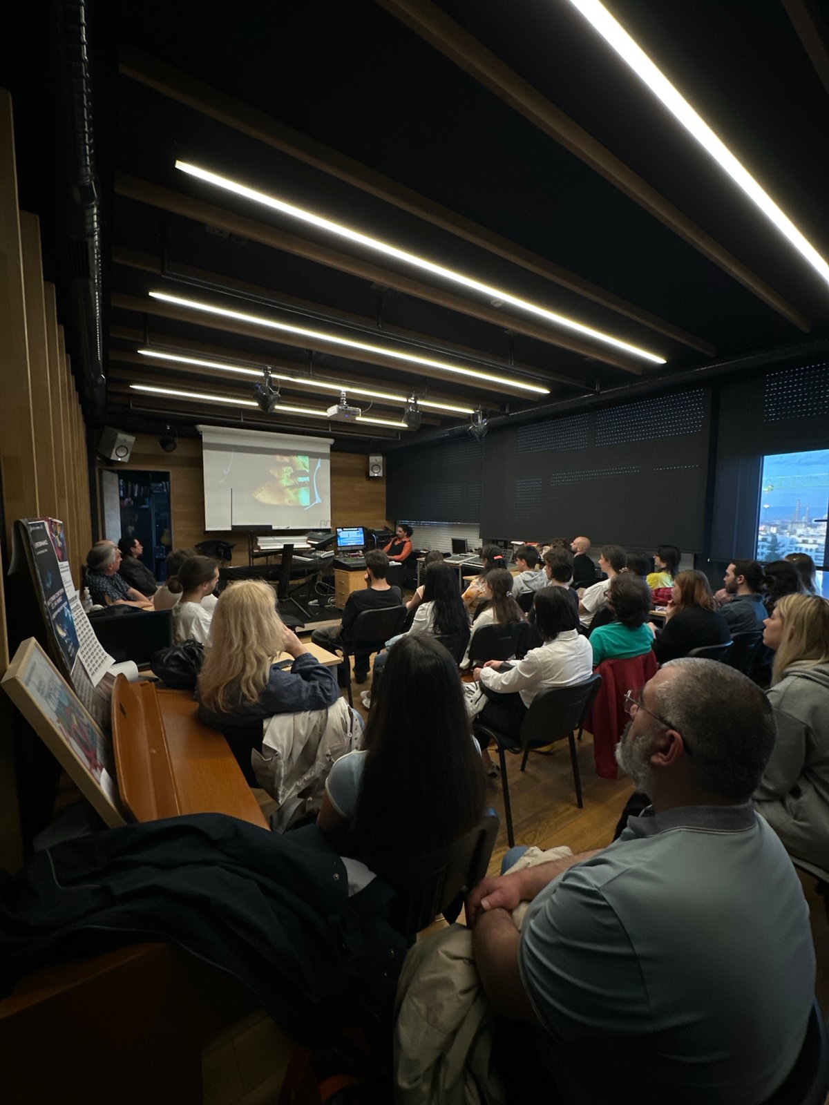 Audience gathered in Sofia auditorium during afternoon event