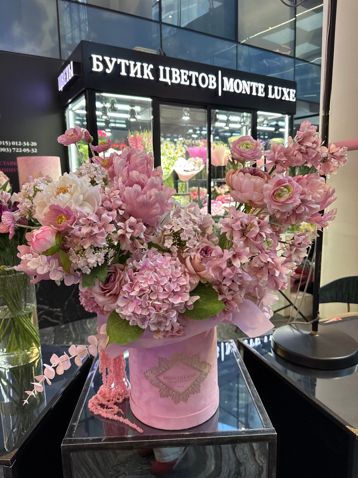 Elegant pink and white floral display spotted at upscale boutique