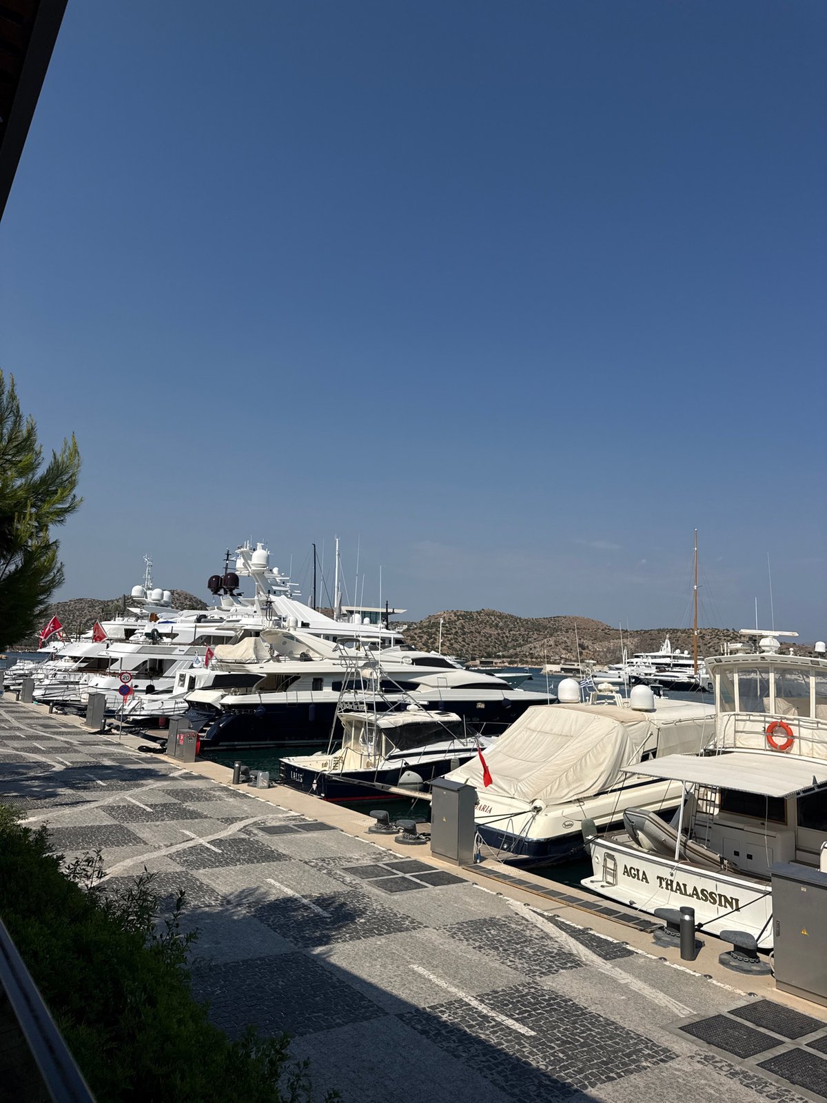 Sunny afternoon at Vouliagmeni's marina and waterfront