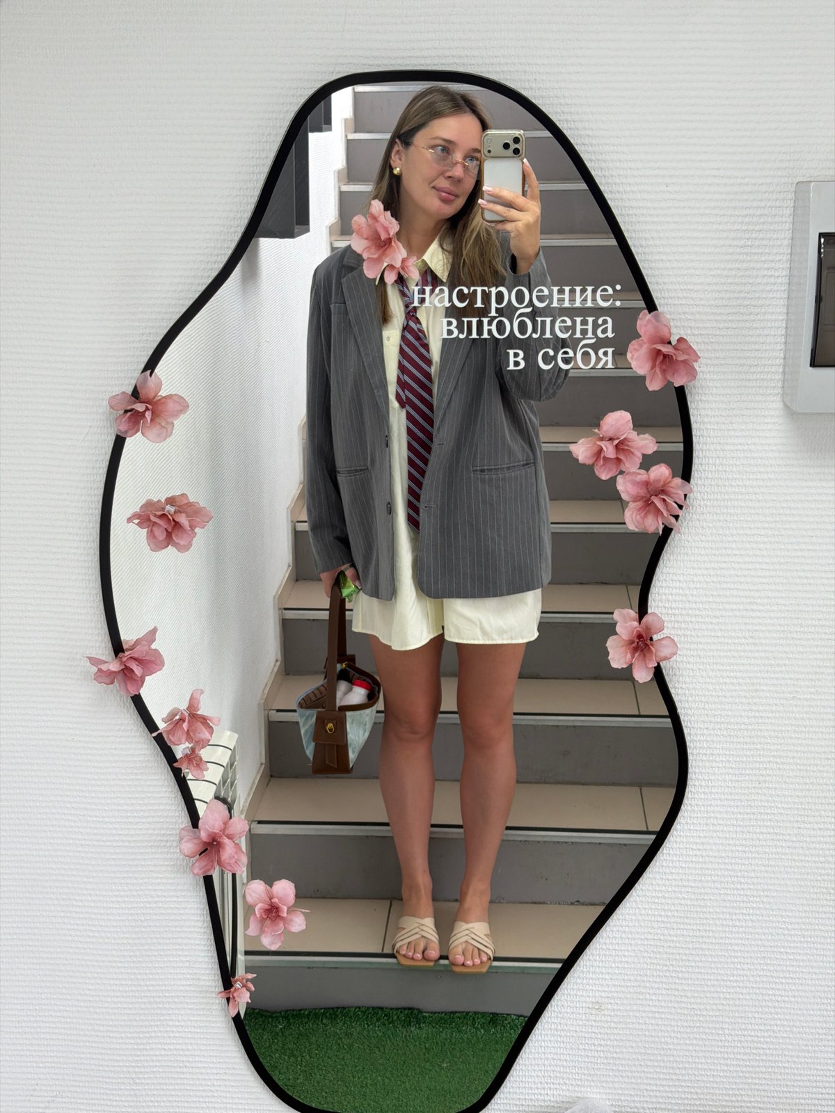 Mirror selfie on a staircase, business-casual outfit with a twist