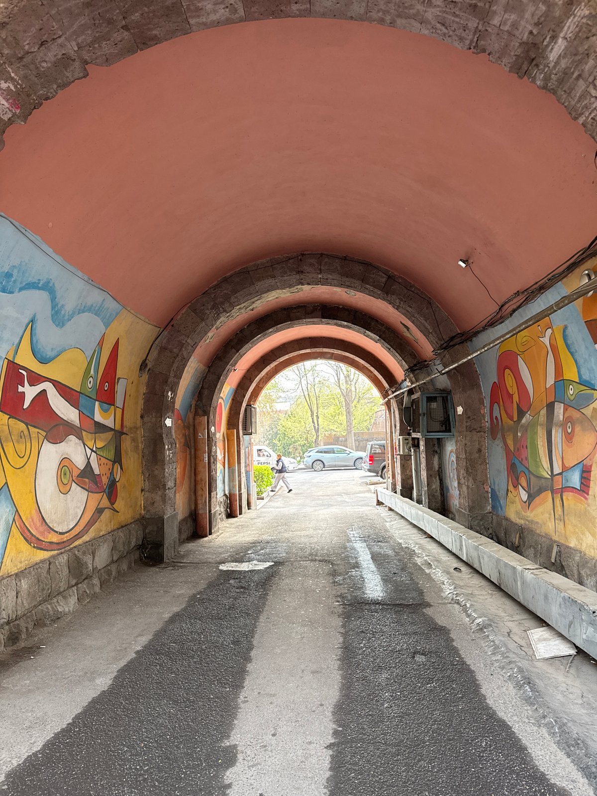 Colorful murals observed on Paparazzi Steps in Yerevan