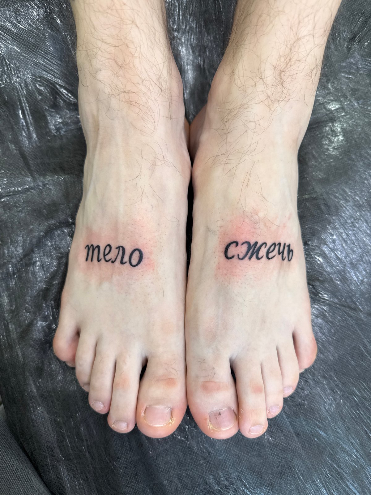Tattoo session captured in Moscow studio photograph