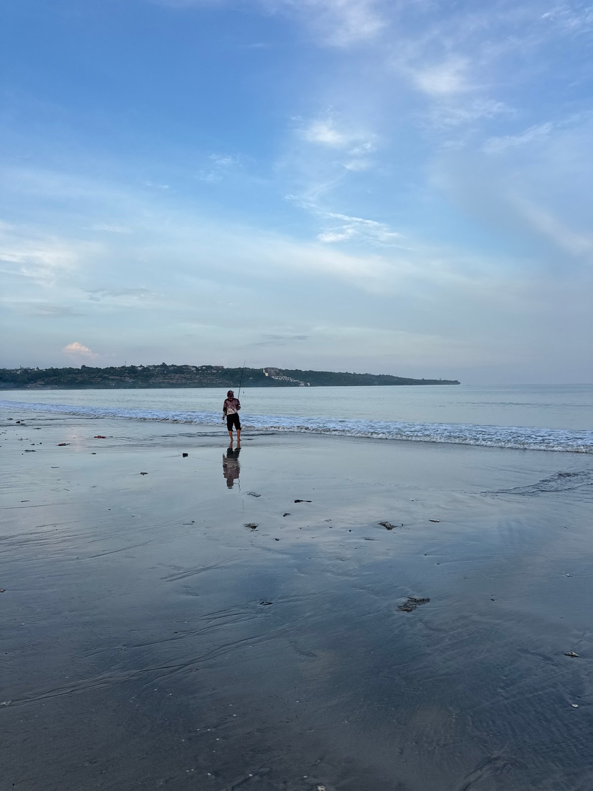 Evening fishing at Jimbaran beach, Indonesia