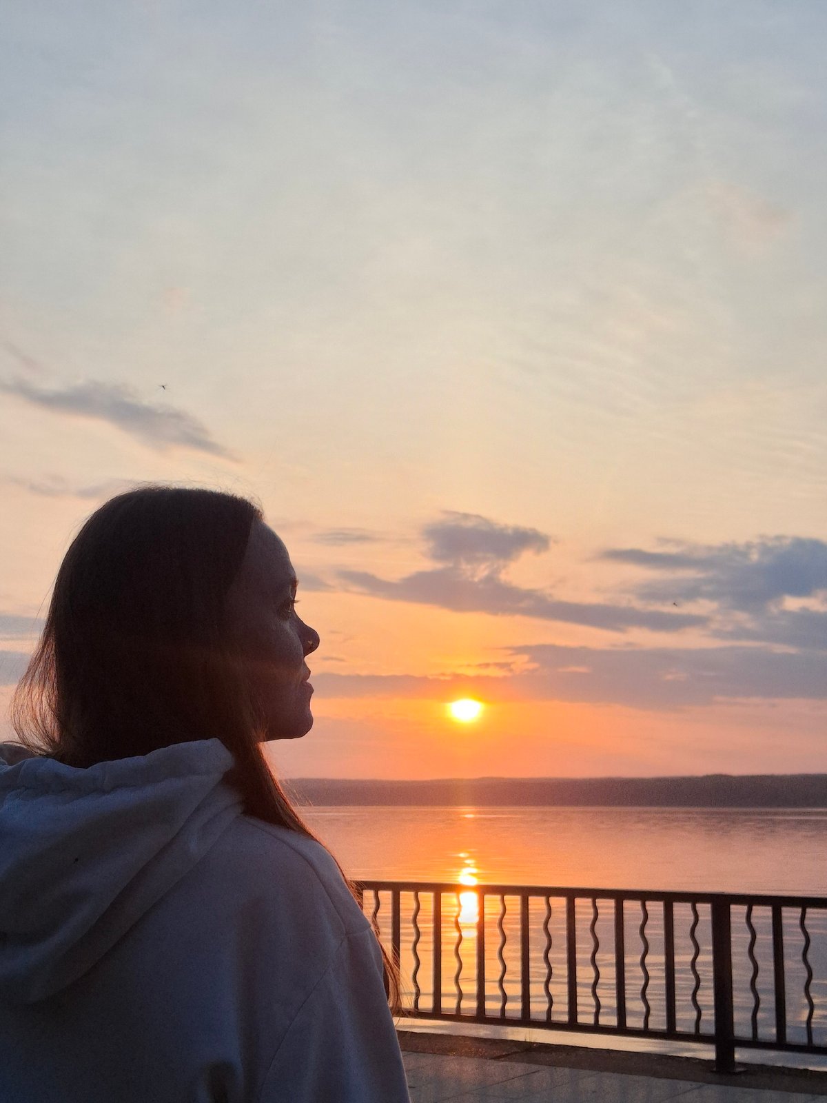 Peaceful sunset evening captured along Chaikovsky waterway, Russia
