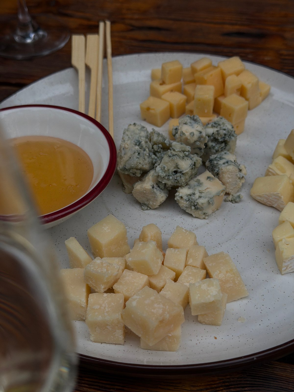 Women share wine and cheese at Bishkek outdoor cafe