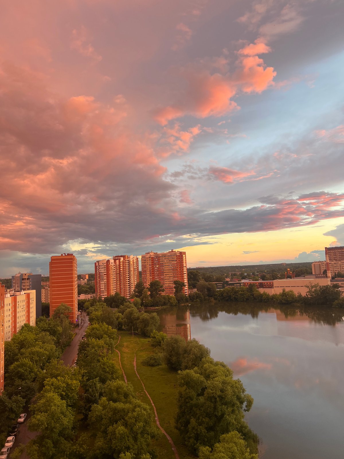 Pushkino at golden hour, wet streets and dramatic skies
