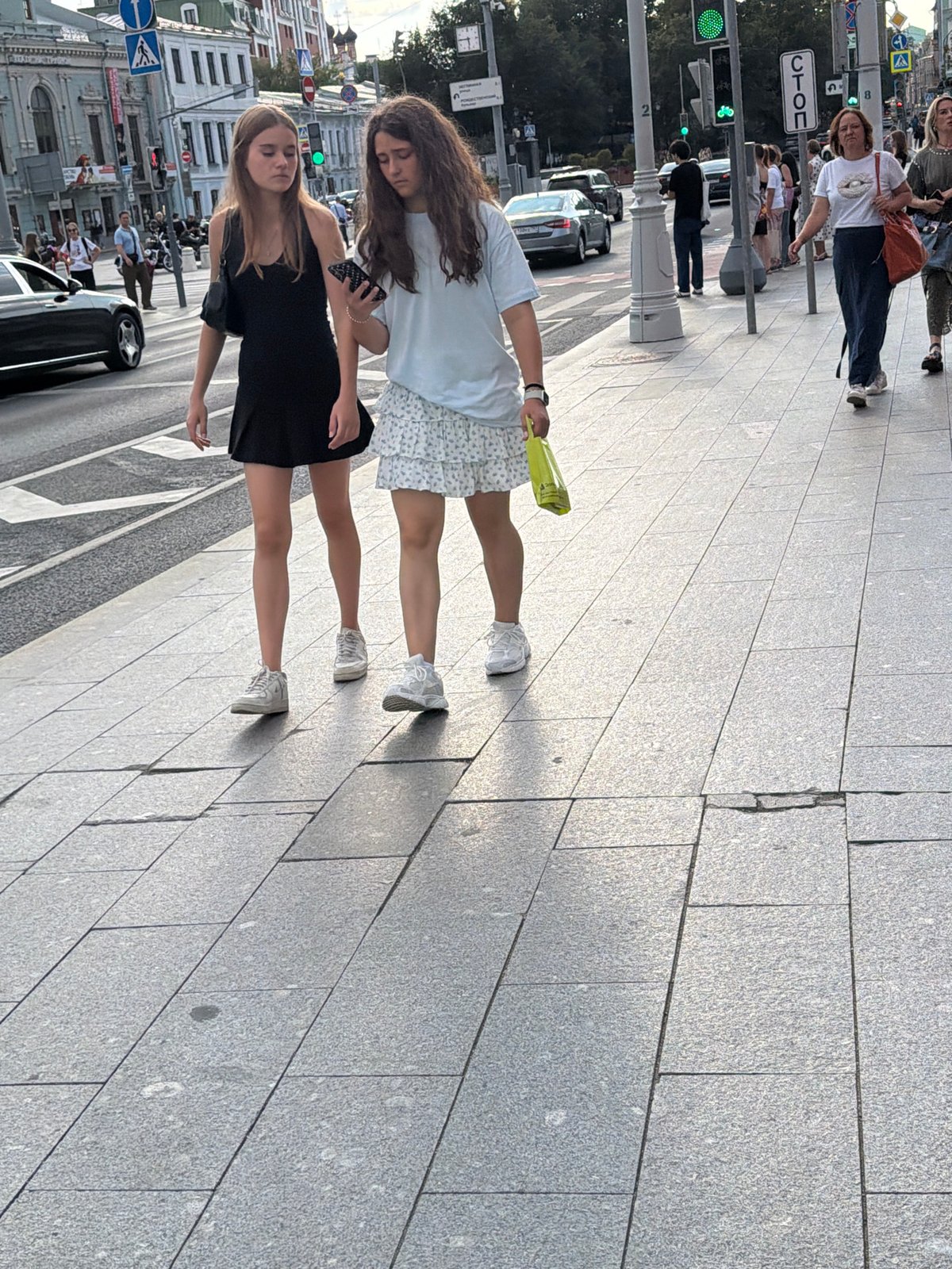 Street and subway life in a busy city on a summer afternoon