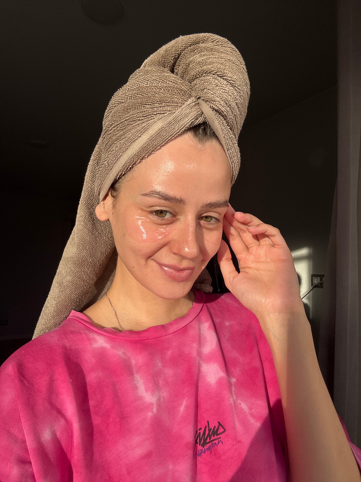 Woman's morning routine with pet cockatiel companion in Krasnoyarsk