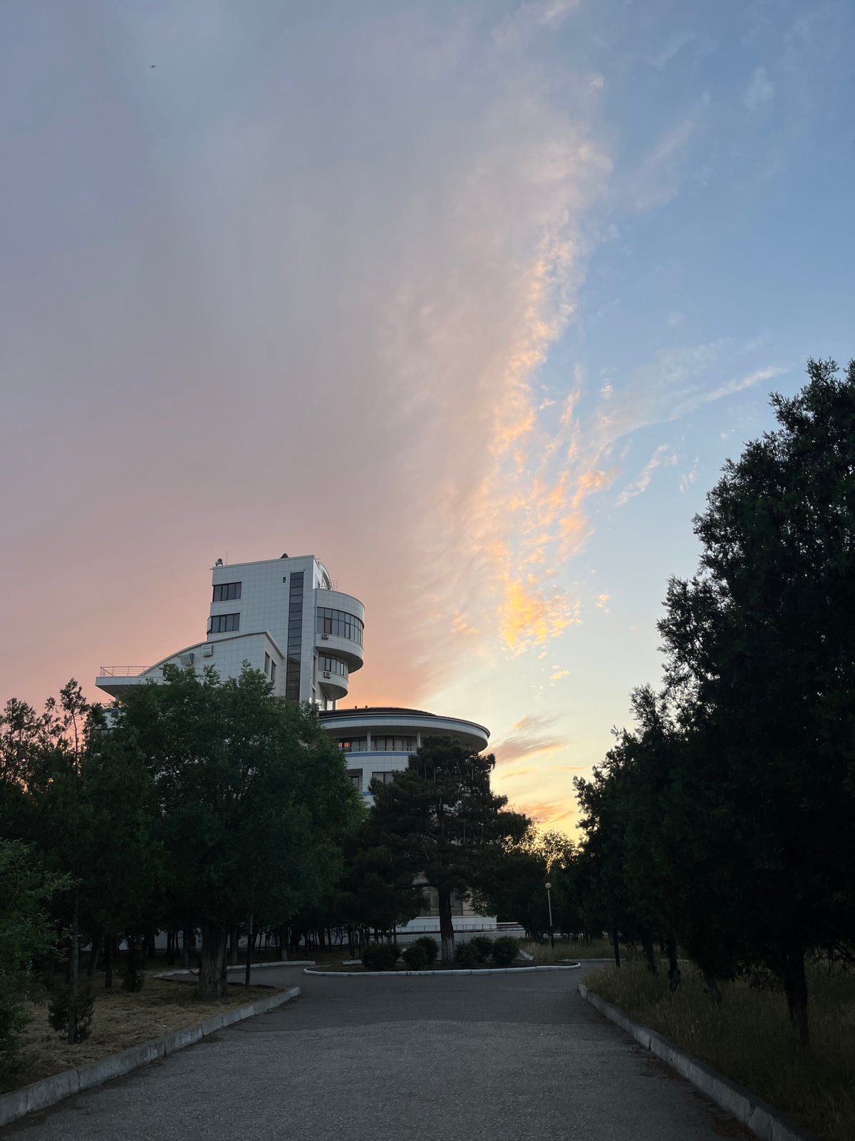 Sunset scenes documented in Kaspiysk, Russia street and buildings