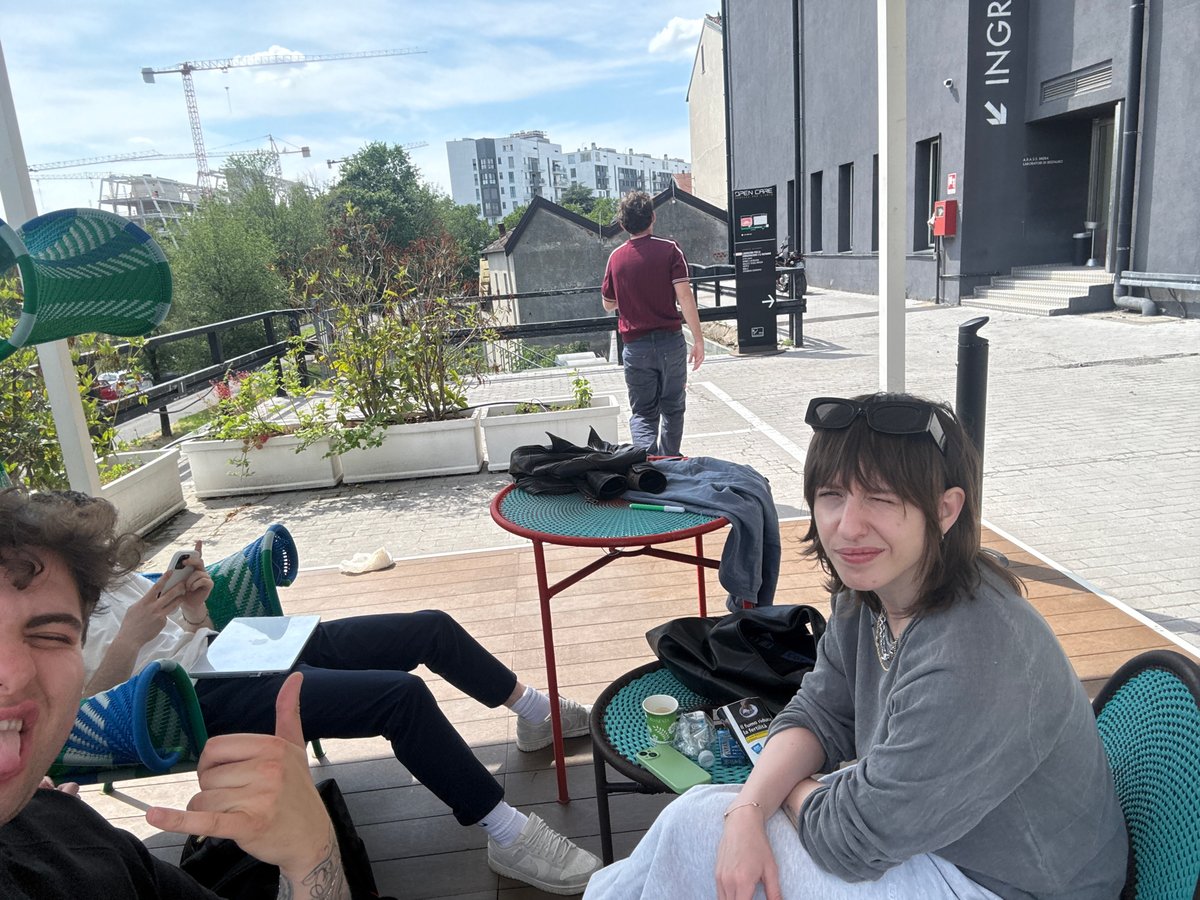 Young adults gather for casual patio meeting in Milan