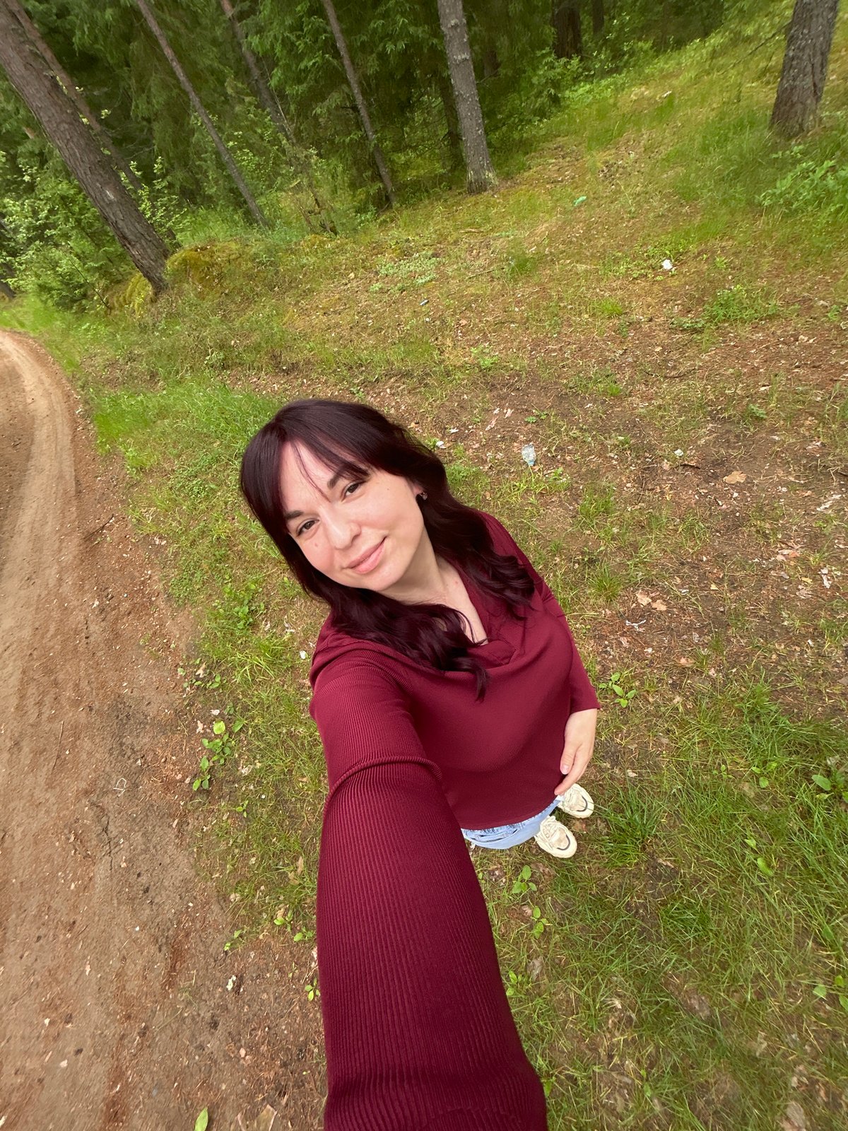 Woman takes forest selfies in Chaykovsky, Russia