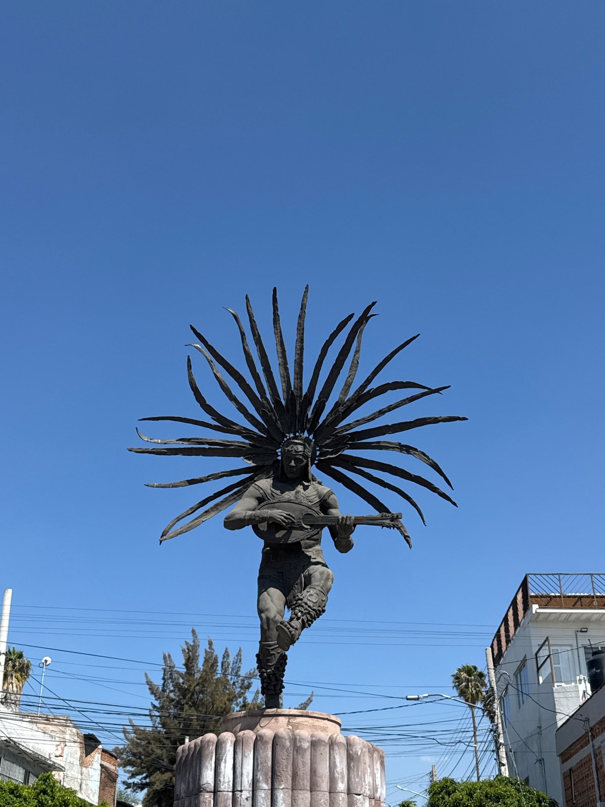 Indigenous musician statue observed in Querétaro, Mexico